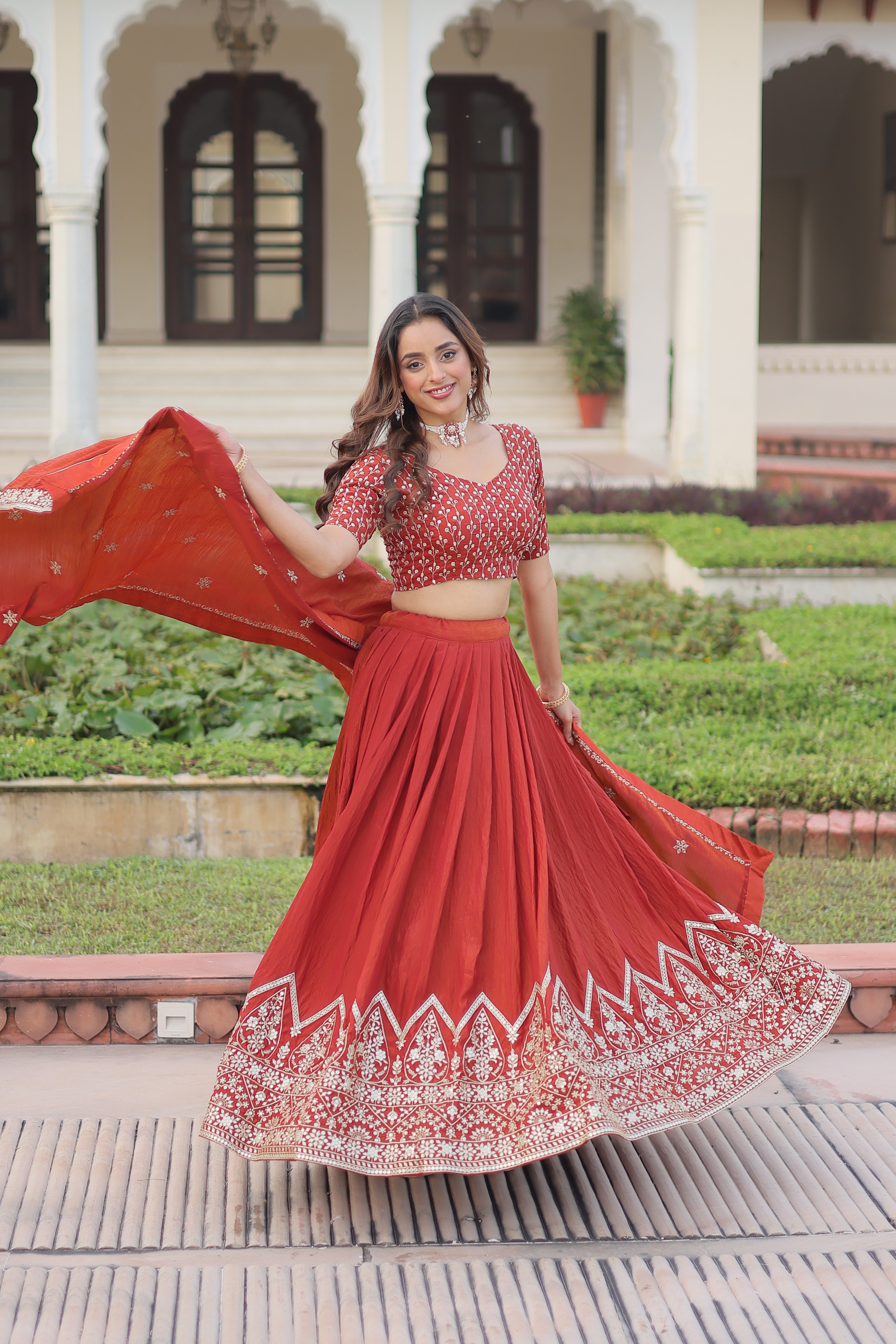 Omira orange Vichitra silk lehenga choli with sequins thread embroidery work