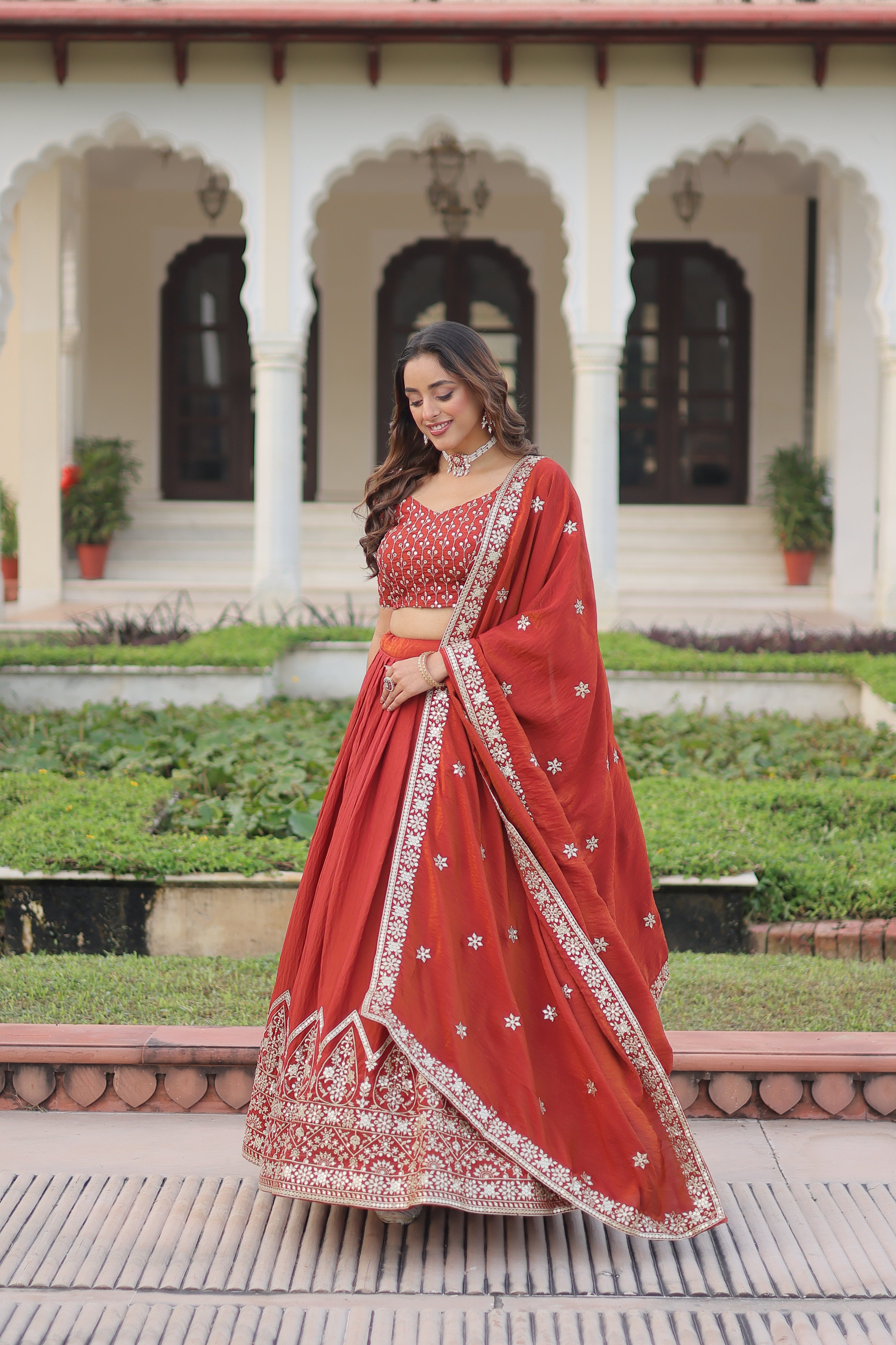 Omira orange Vichitra silk lehenga choli with sequins thread embroidery work