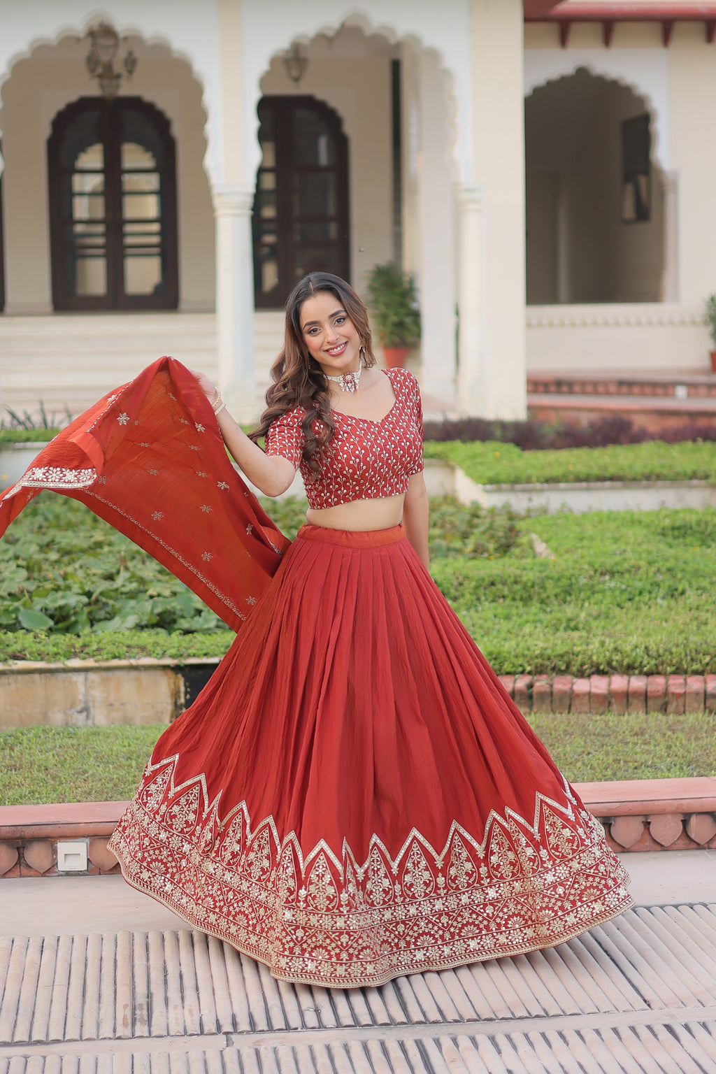 Omira orange Vichitra silk lehenga choli with sequins thread embroidery work