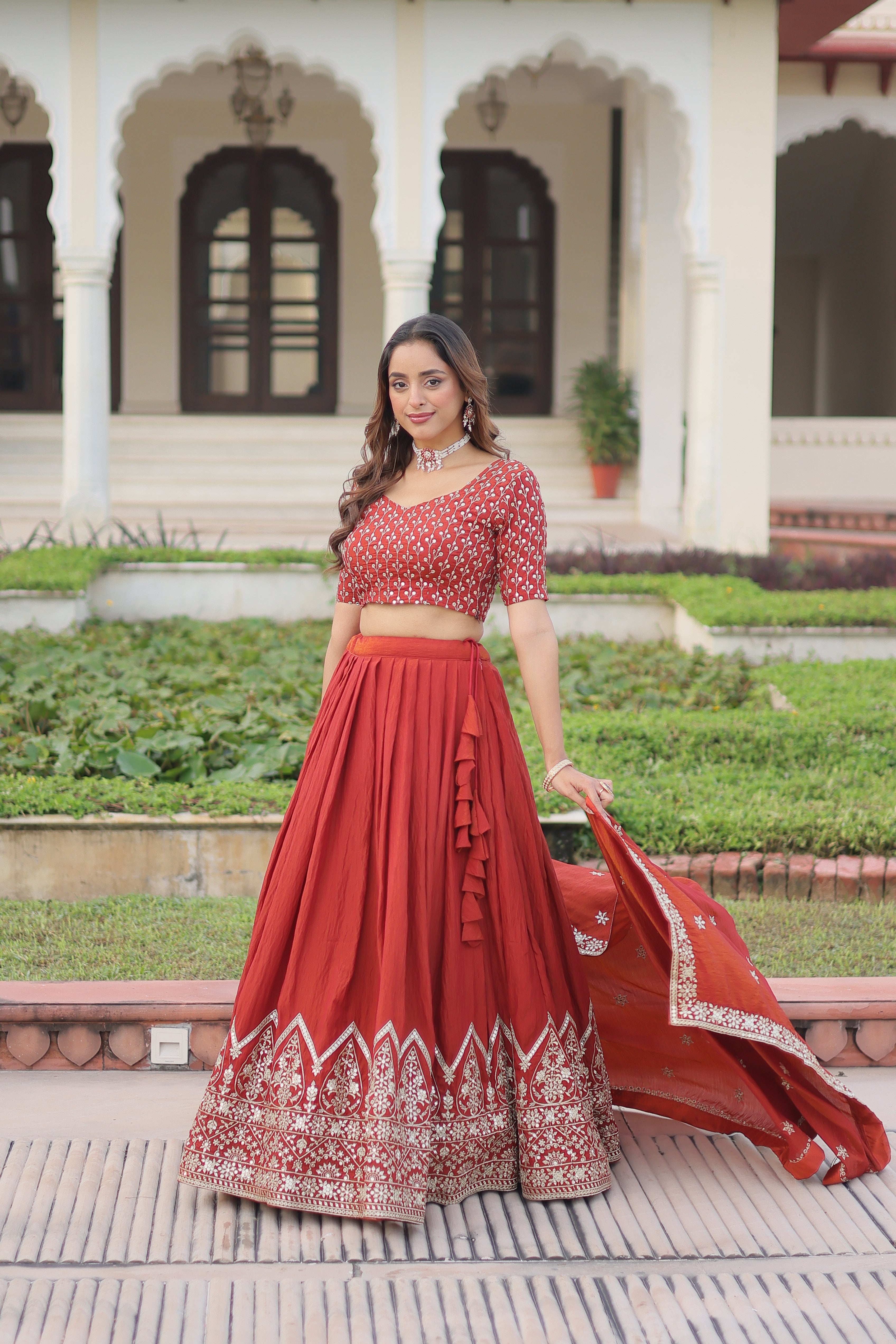 Omira orange Vichitra silk lehenga choli with sequins thread embroidery work