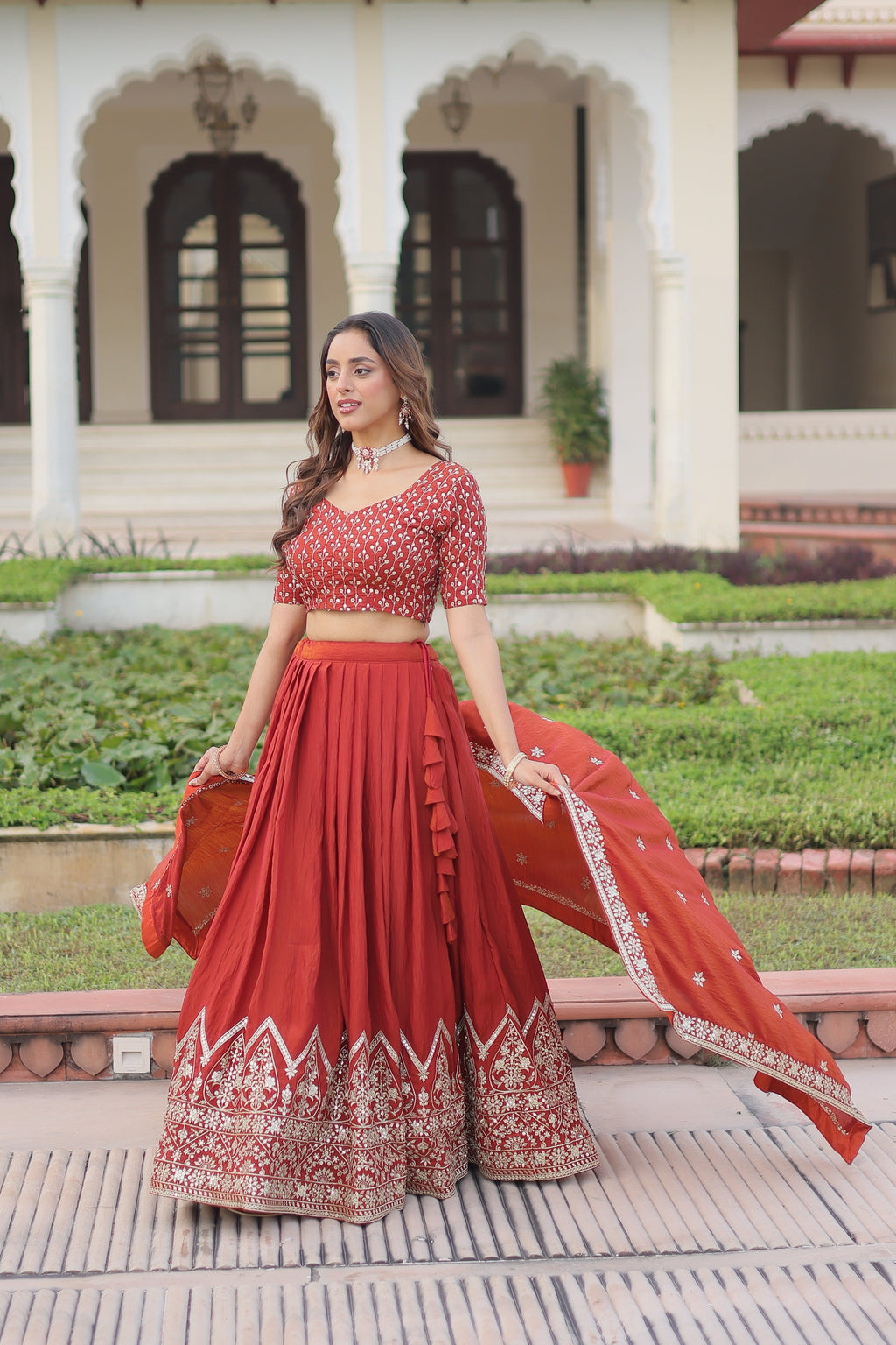 Omira orange Vichitra silk lehenga choli with sequins thread embroidery work