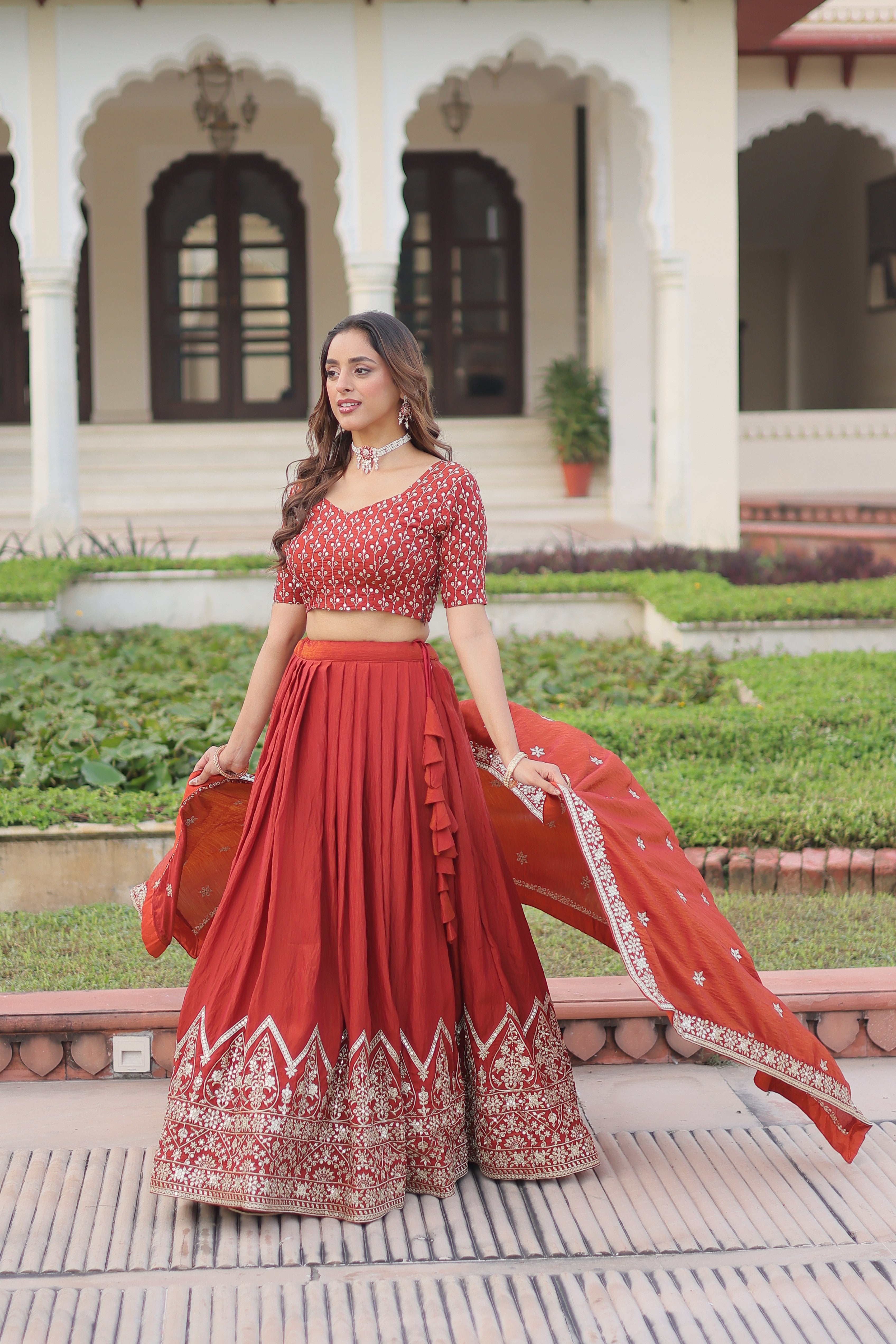 Omira orange Vichitra silk lehenga choli with sequins thread embroidery work