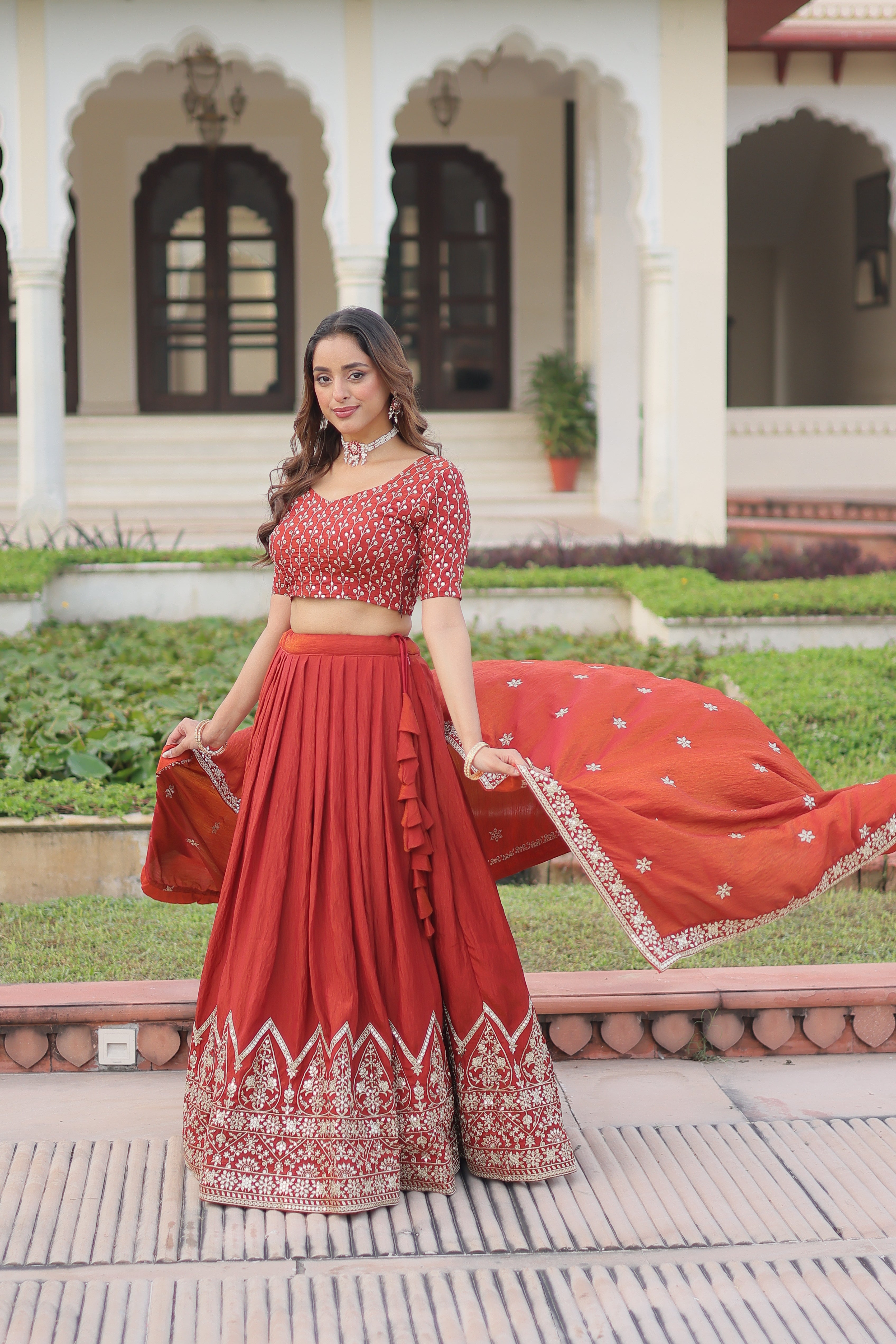 Omira orange Vichitra silk lehenga choli with sequins thread embroidery work