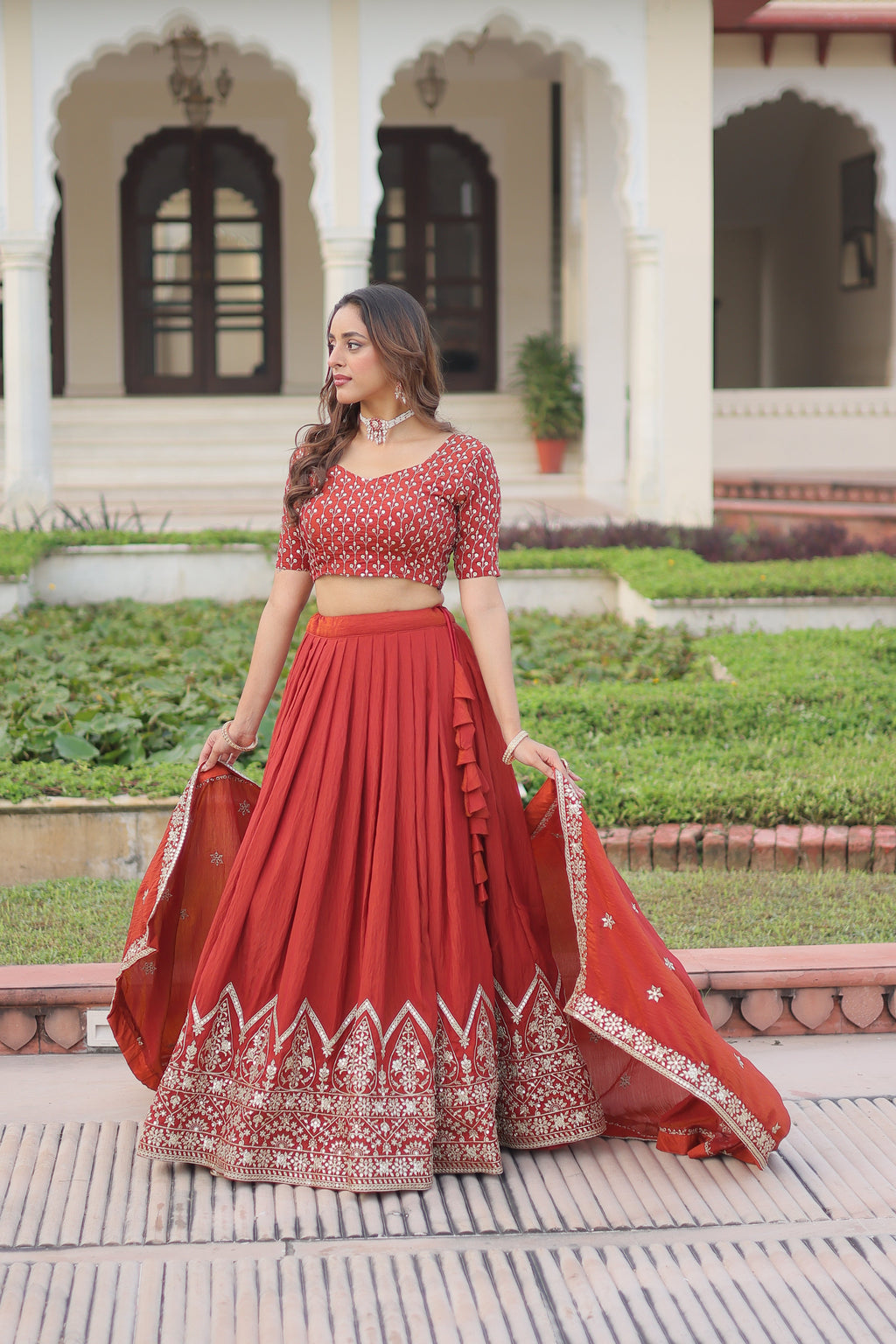Omira orange Vichitra silk lehenga choli with sequins thread embroidery work