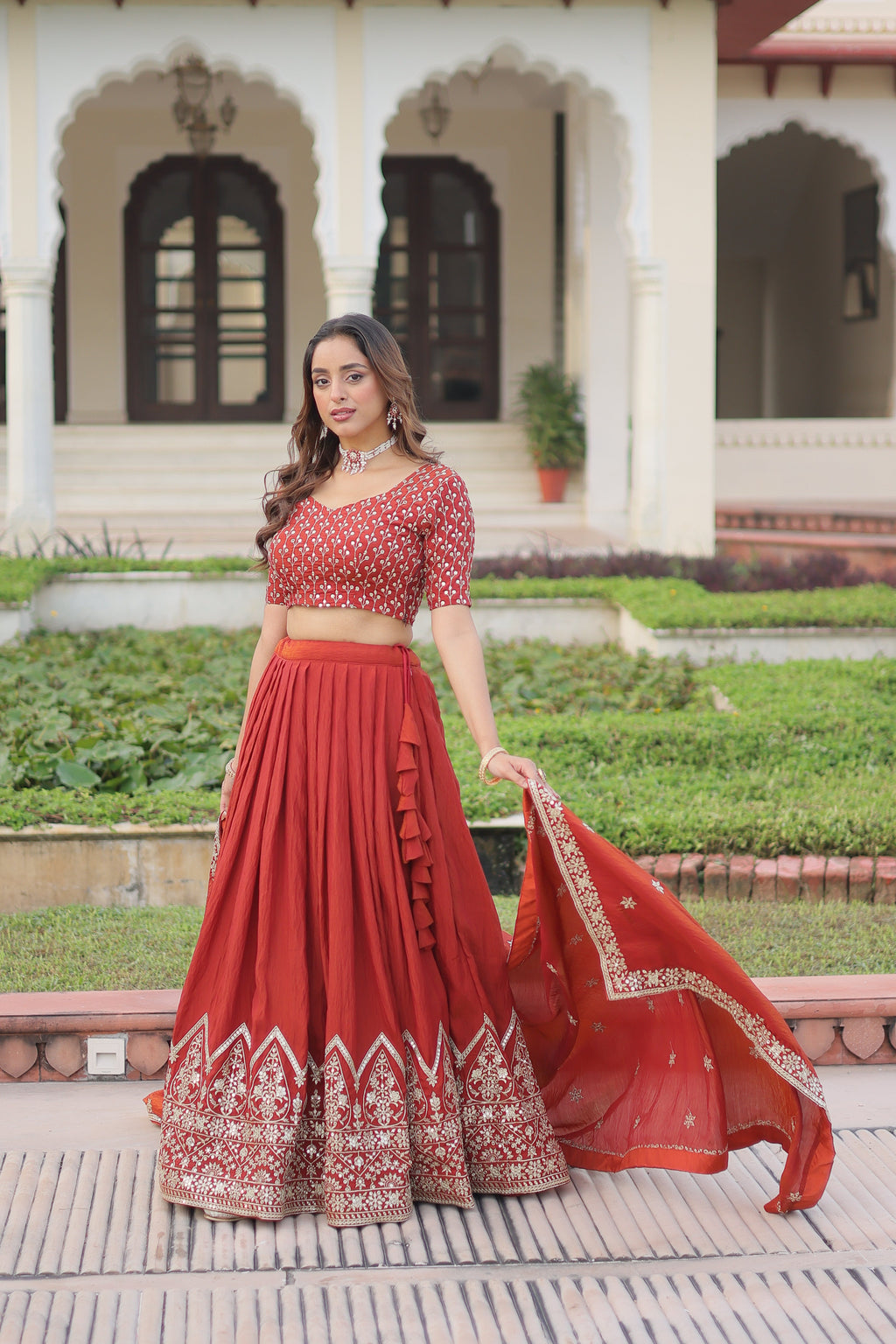 Omira orange Vichitra silk lehenga choli with sequins thread embroidery work