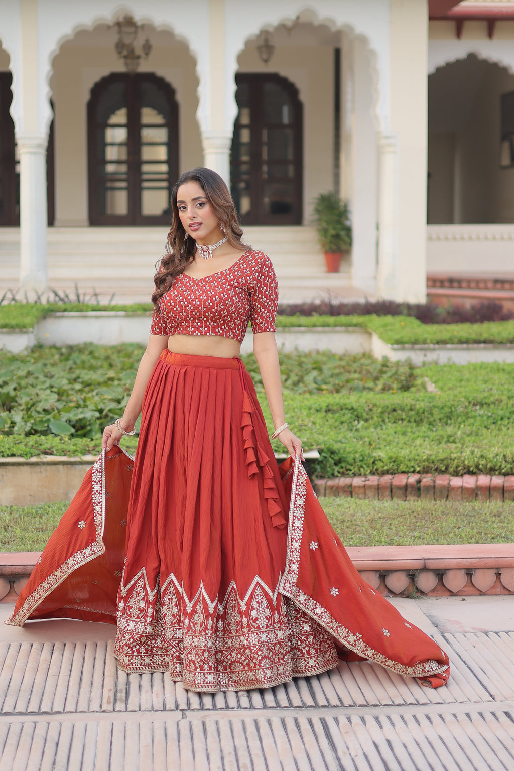 Omira orange Vichitra silk lehenga choli with sequins thread embroidery work