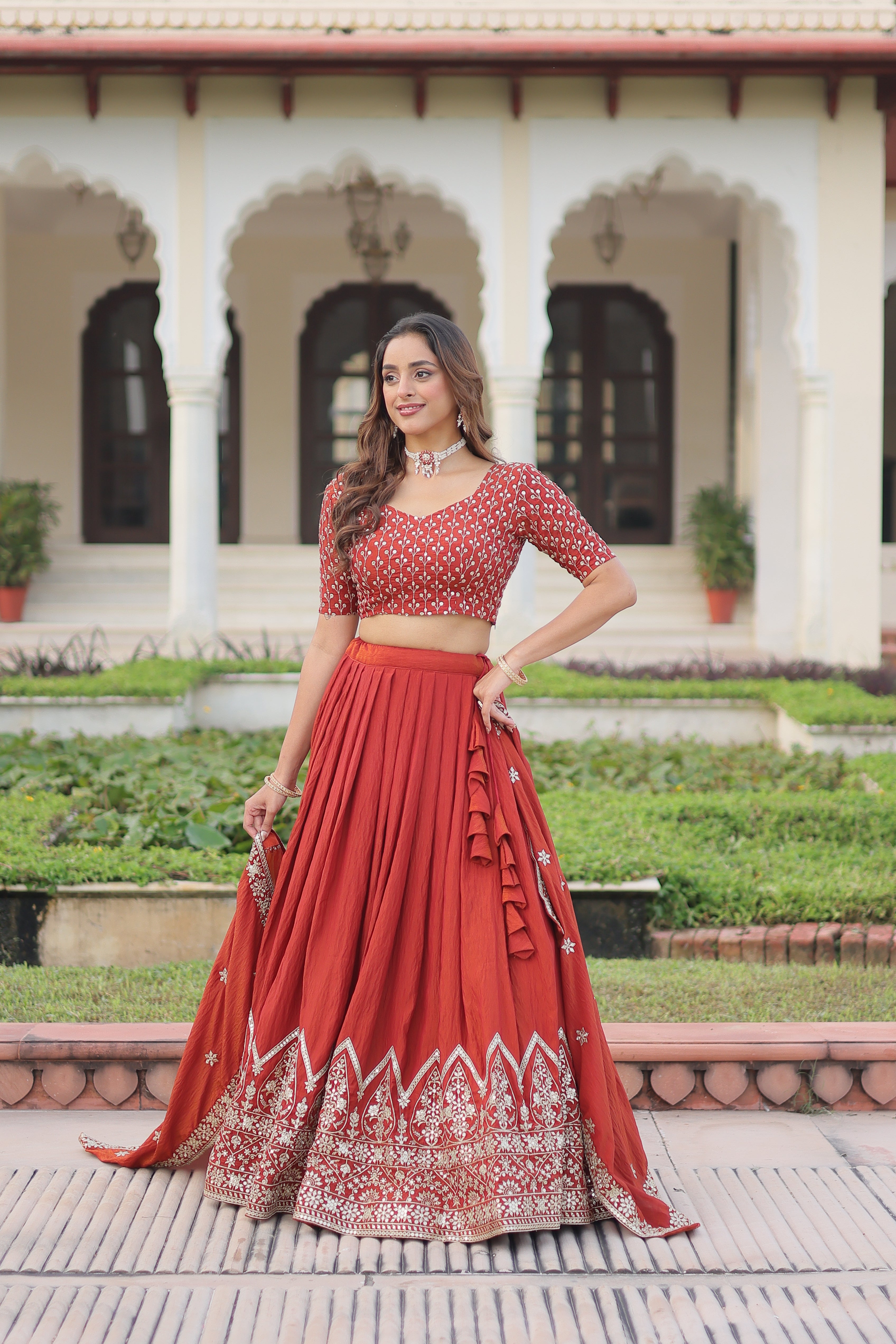 Omira orange Vichitra silk lehenga choli with sequins thread embroidery work