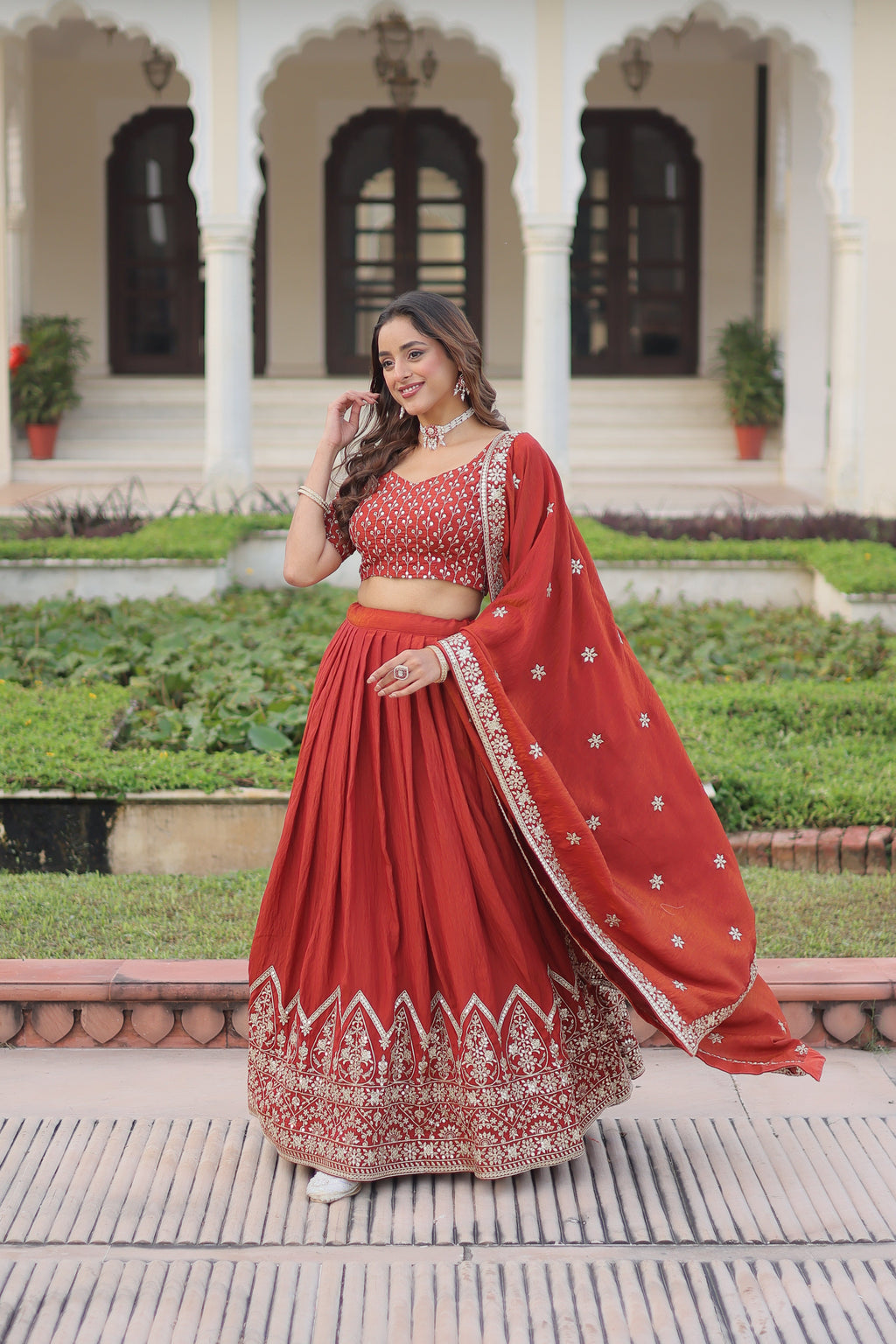 Omira orange Vichitra silk lehenga choli with sequins thread embroidery work