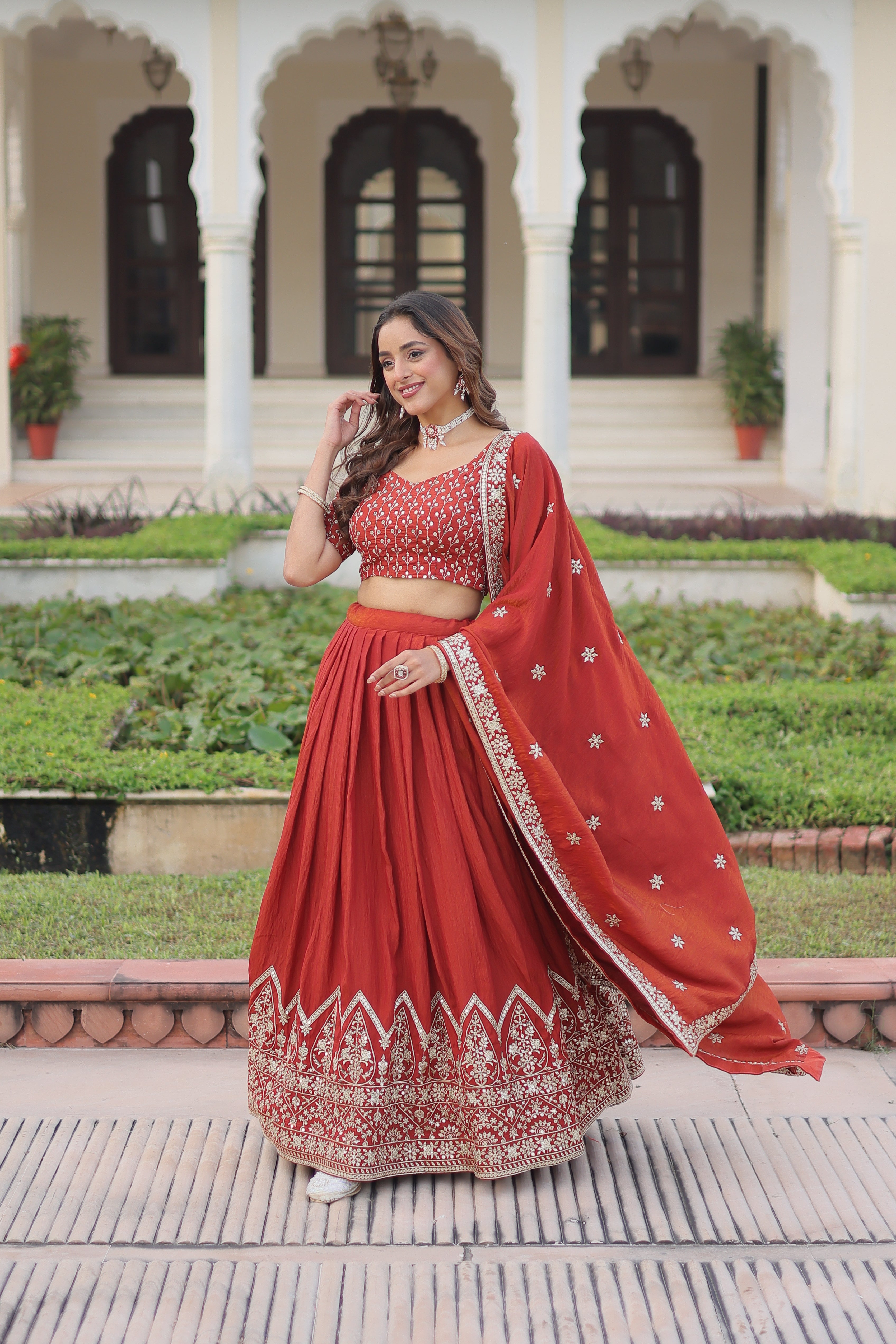 Omira orange Vichitra silk lehenga choli with sequins thread embroidery work