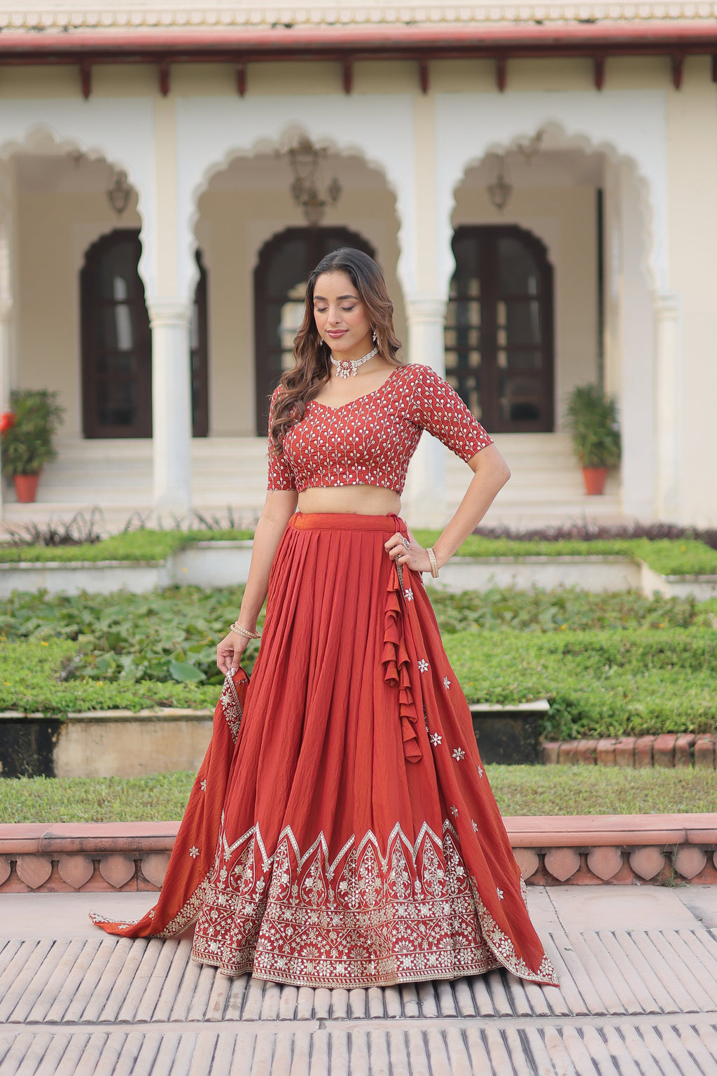 Omira orange Vichitra silk lehenga choli with sequins thread embroidery work