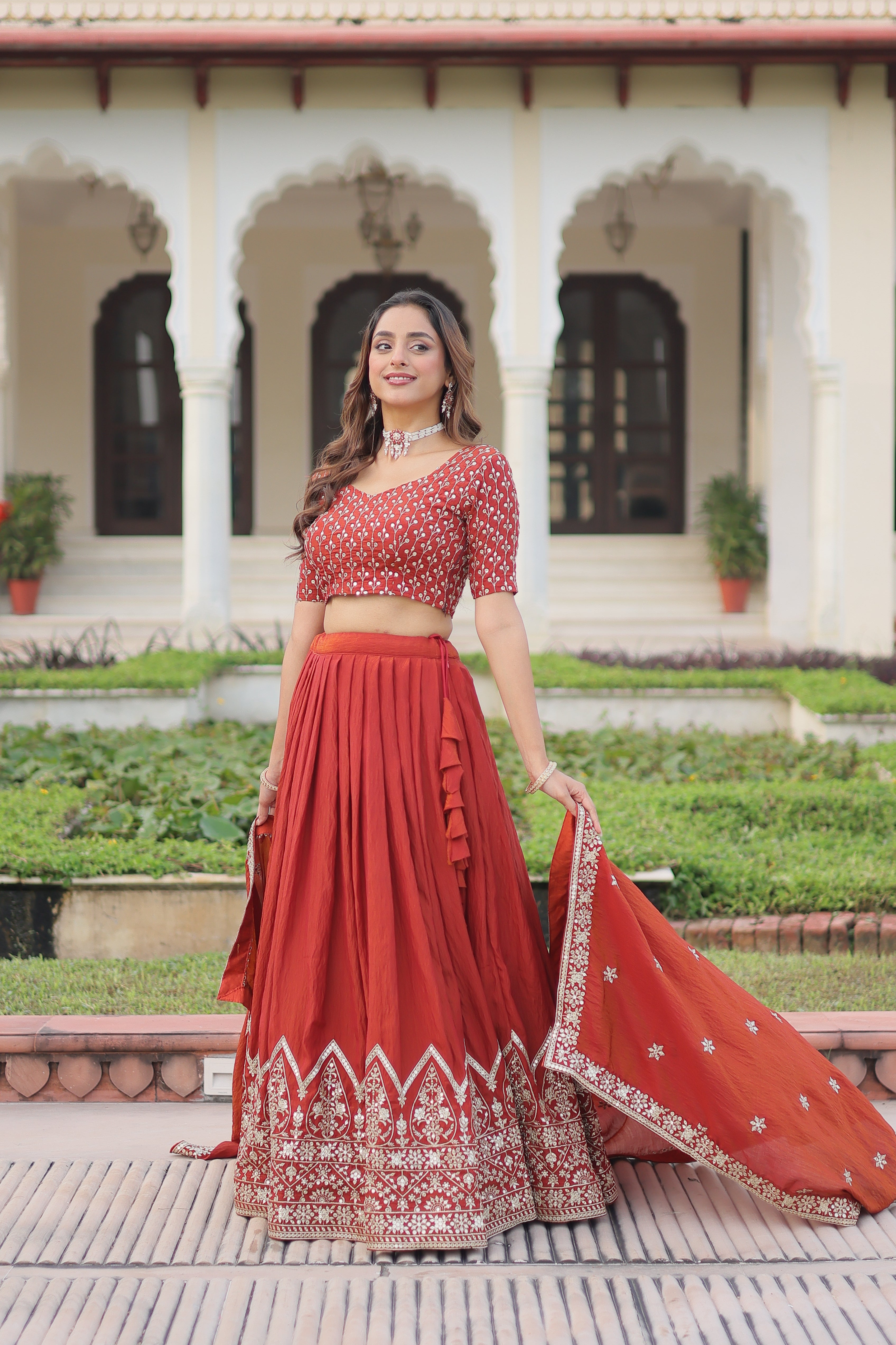 Omira orange Vichitra silk lehenga choli with sequins thread embroidery work