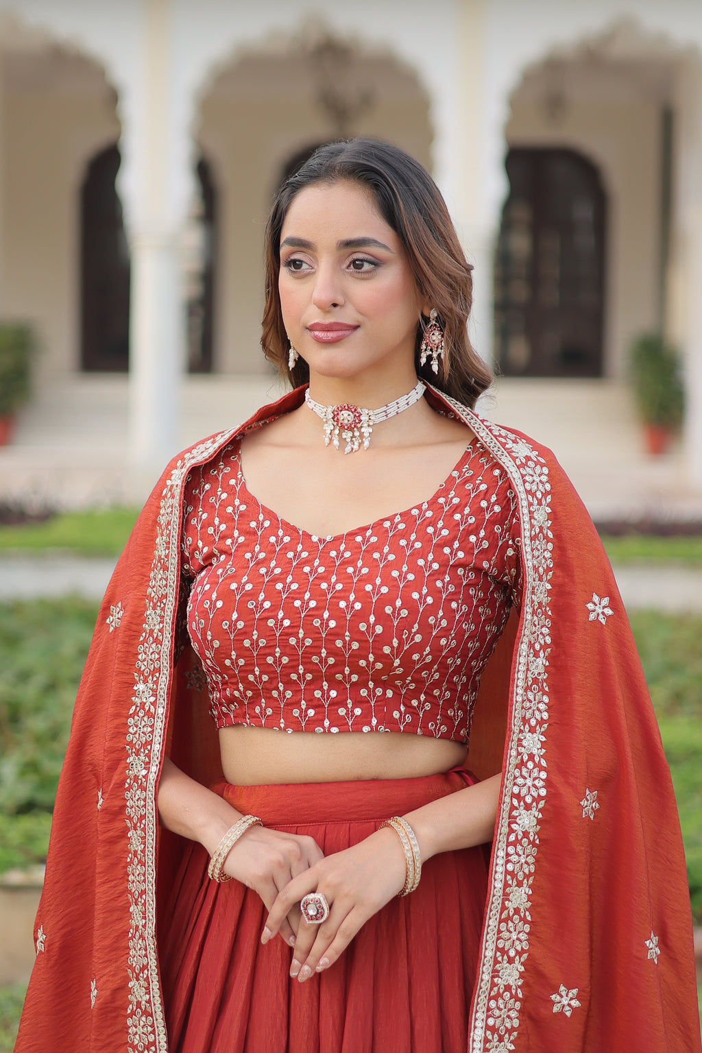 Omira orange Vichitra silk lehenga choli with sequins thread embroidery work