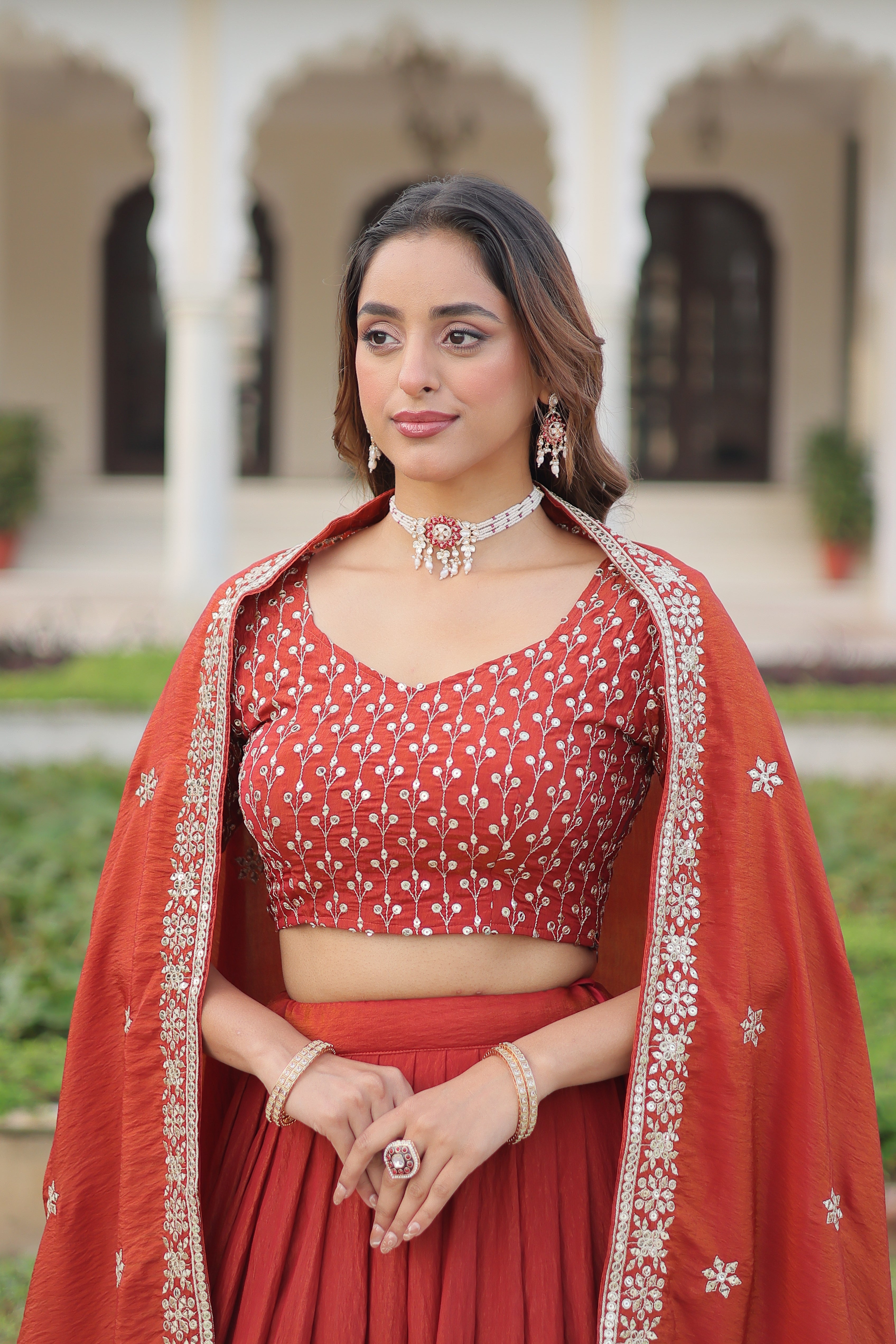 Omira orange Vichitra silk lehenga choli with sequins thread embroidery work