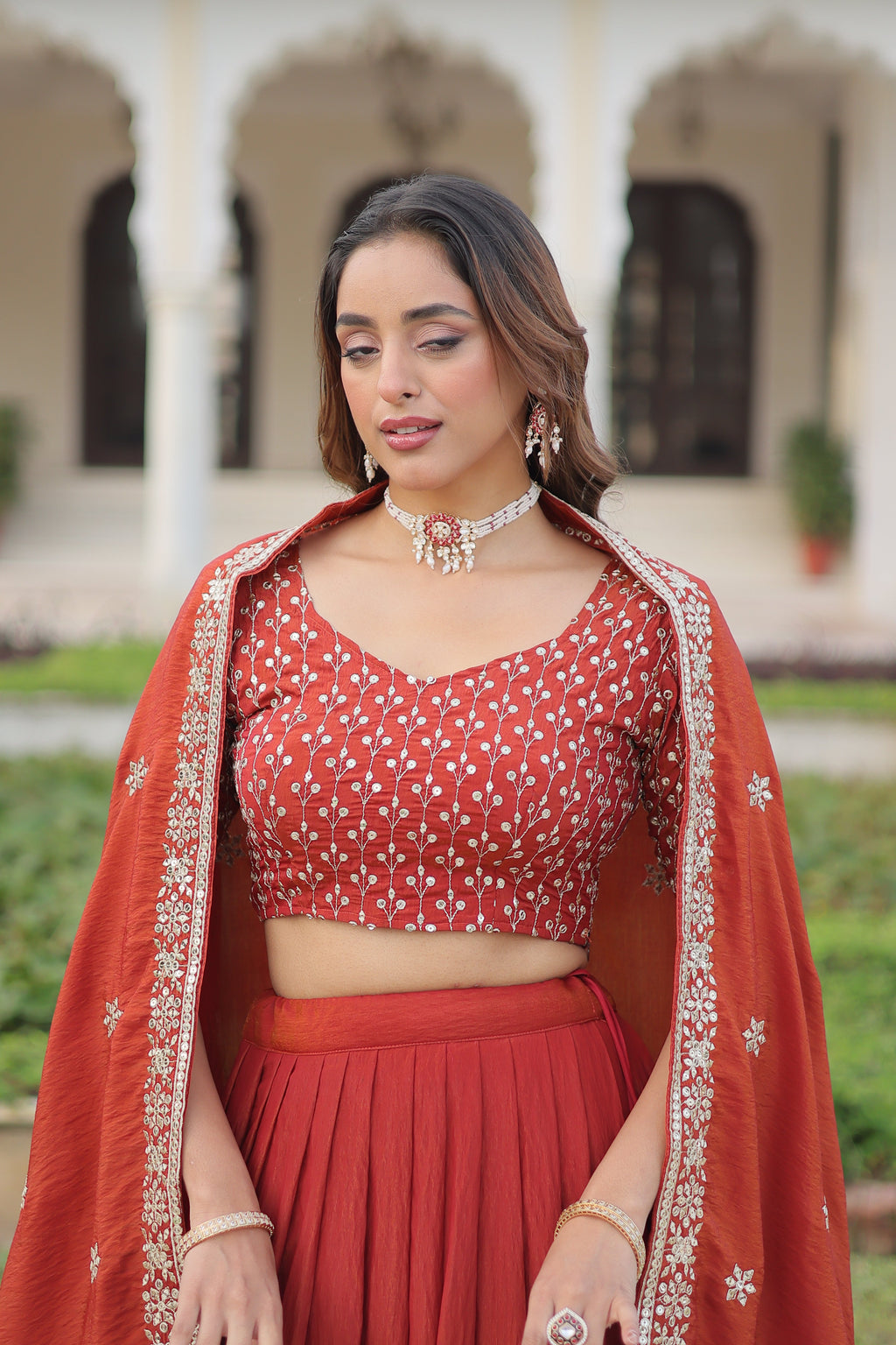 Omira orange Vichitra silk lehenga choli with sequins thread embroidery work