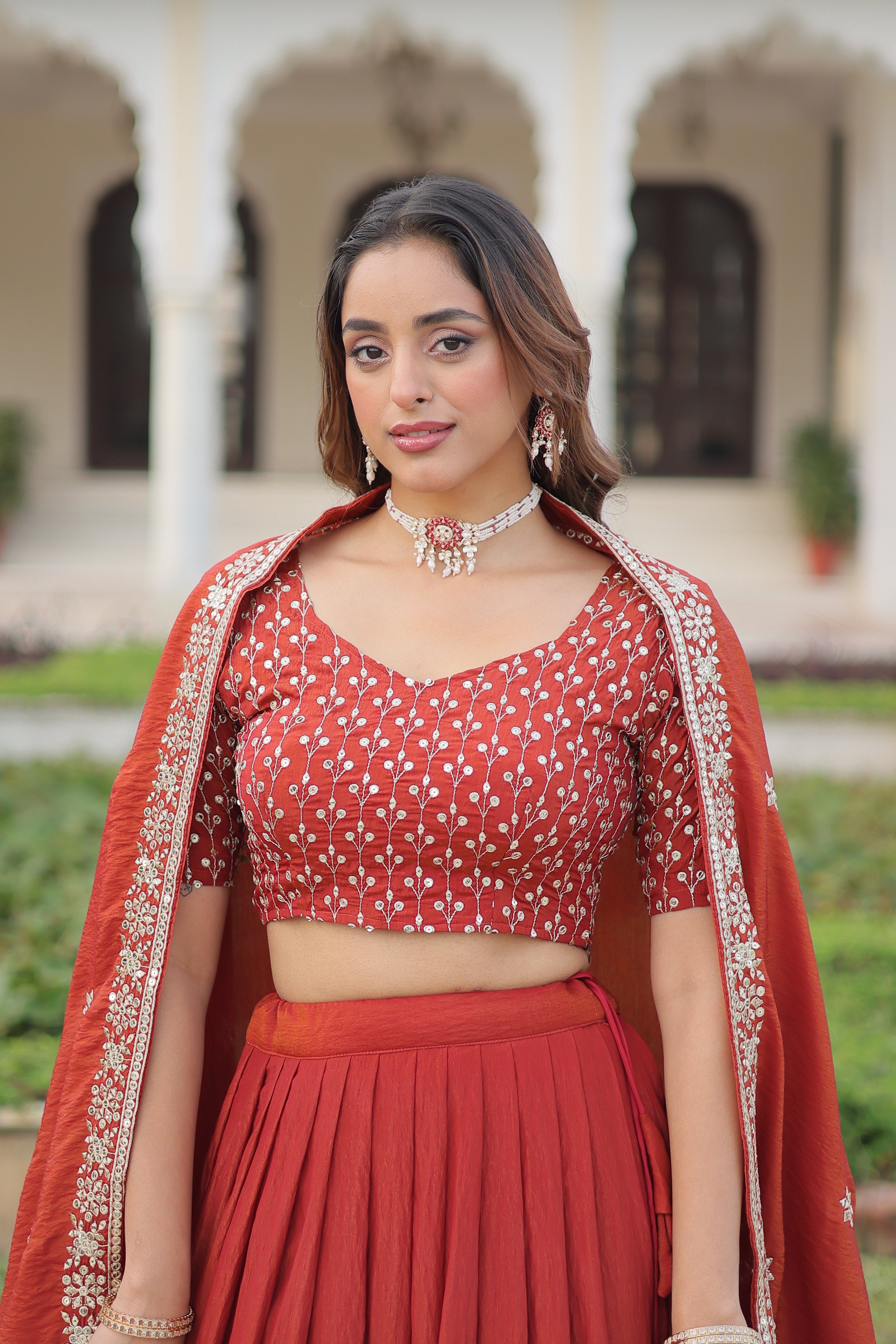 Omira orange Vichitra silk lehenga choli with sequins thread embroidery work