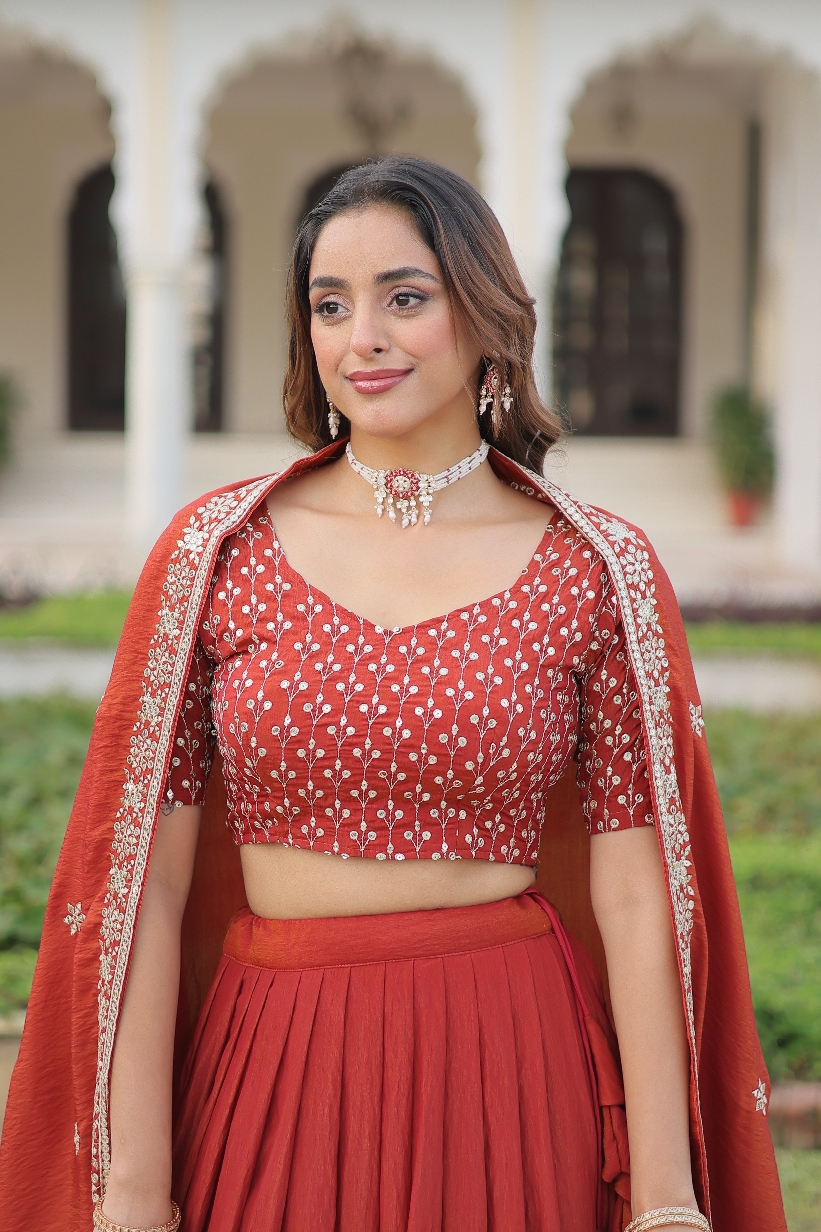 Omira orange Vichitra silk lehenga choli with sequins thread embroidery work