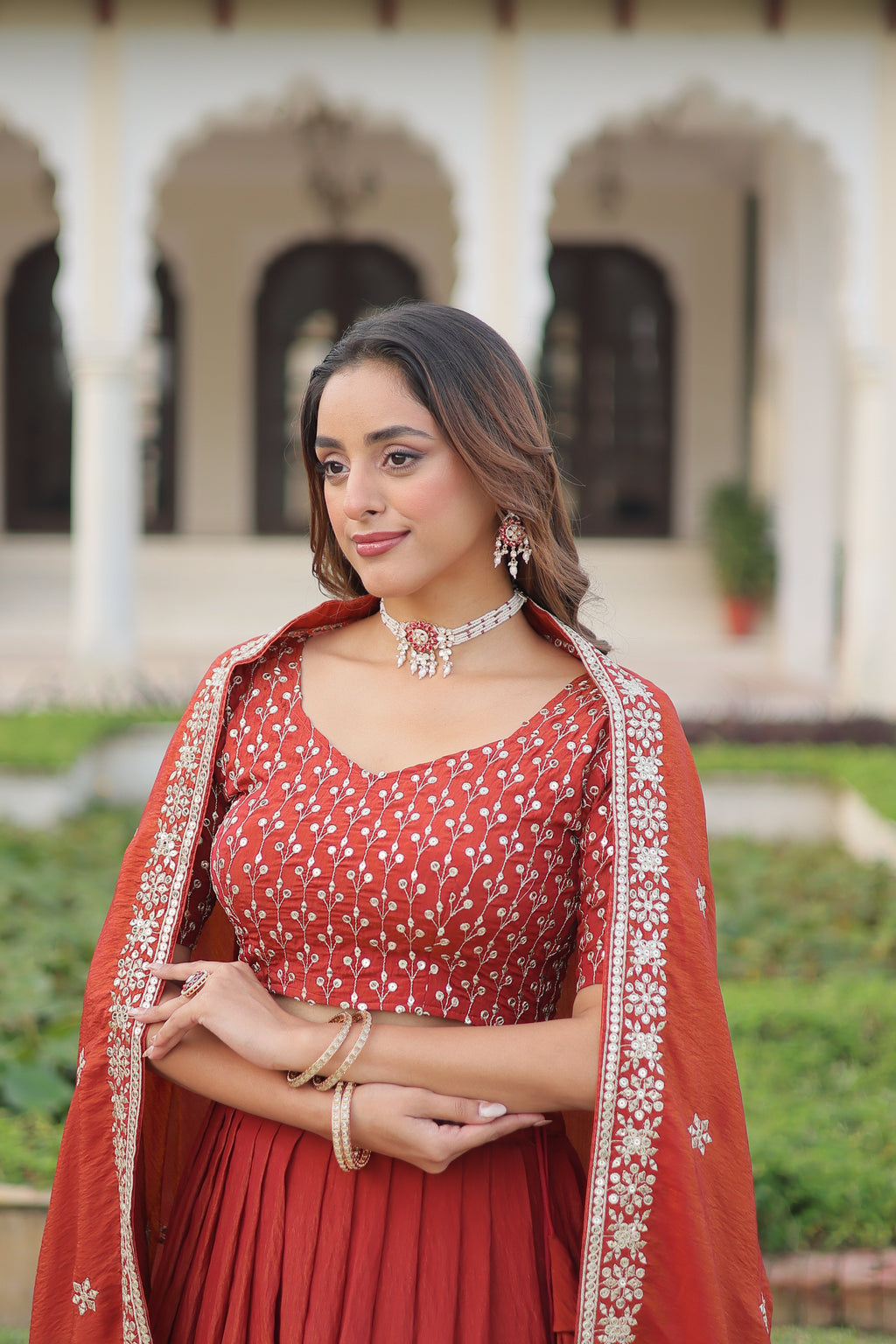 Omira orange Vichitra silk lehenga choli with sequins thread embroidery work