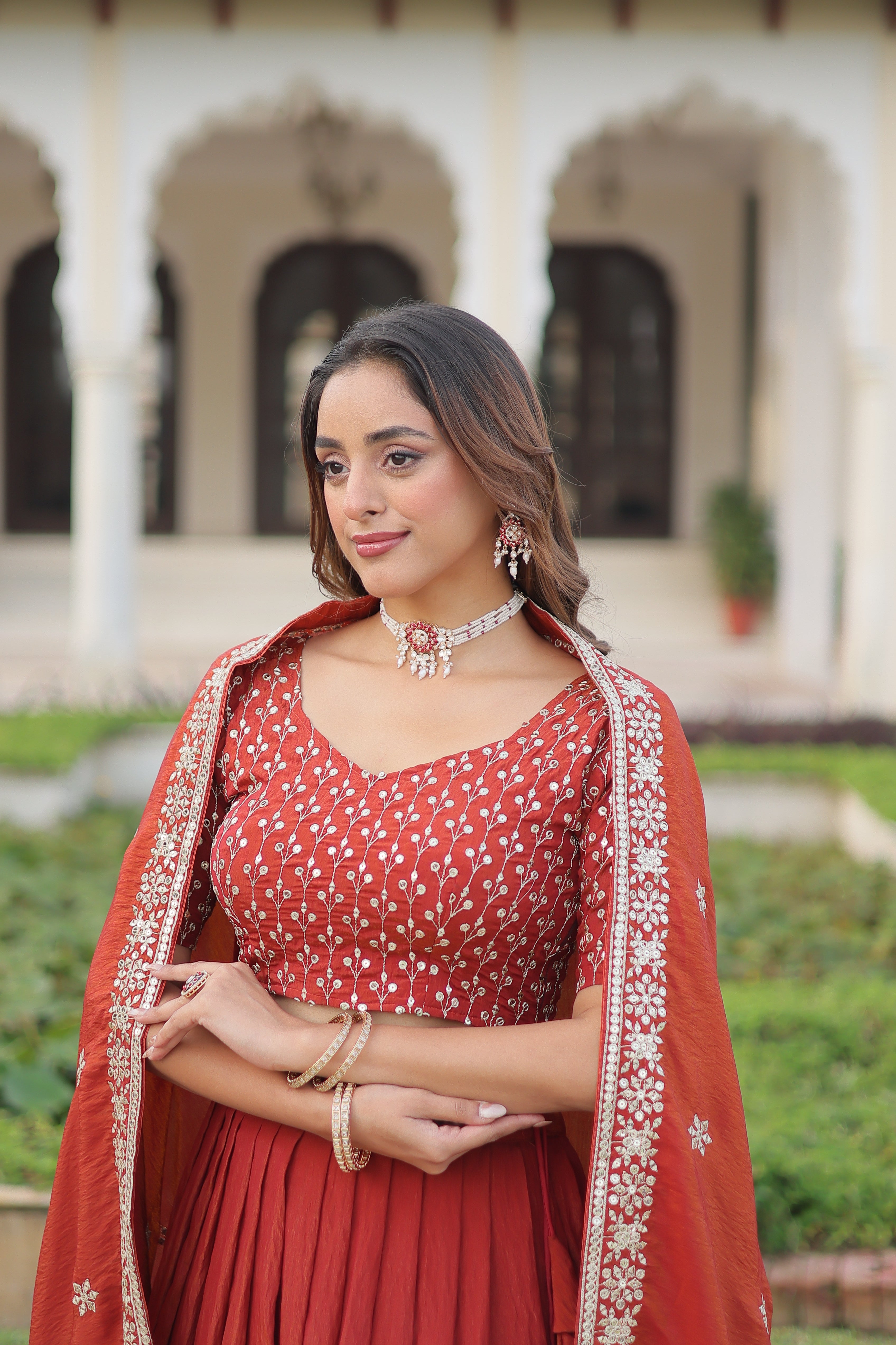 Omira orange Vichitra silk lehenga choli with sequins thread embroidery work