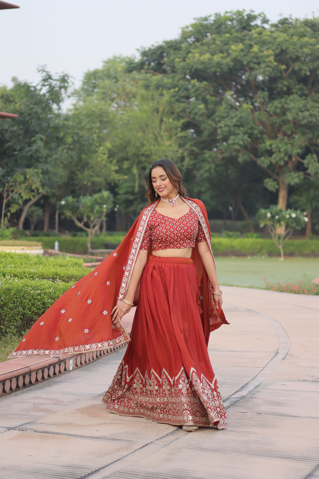 Omira orange Vichitra silk lehenga choli with sequins thread embroidery work
