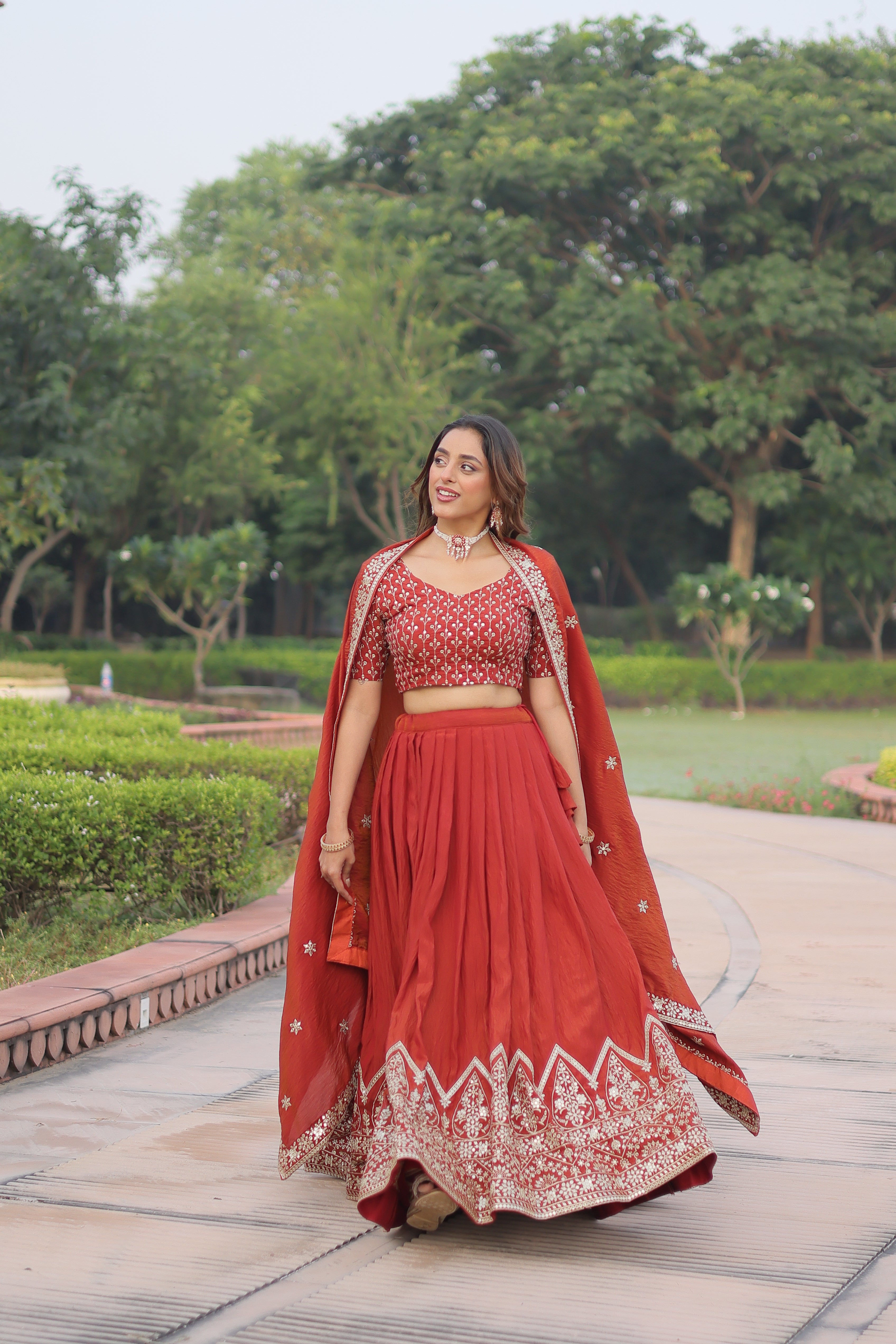 Omira orange Vichitra silk lehenga choli with sequins thread embroidery work