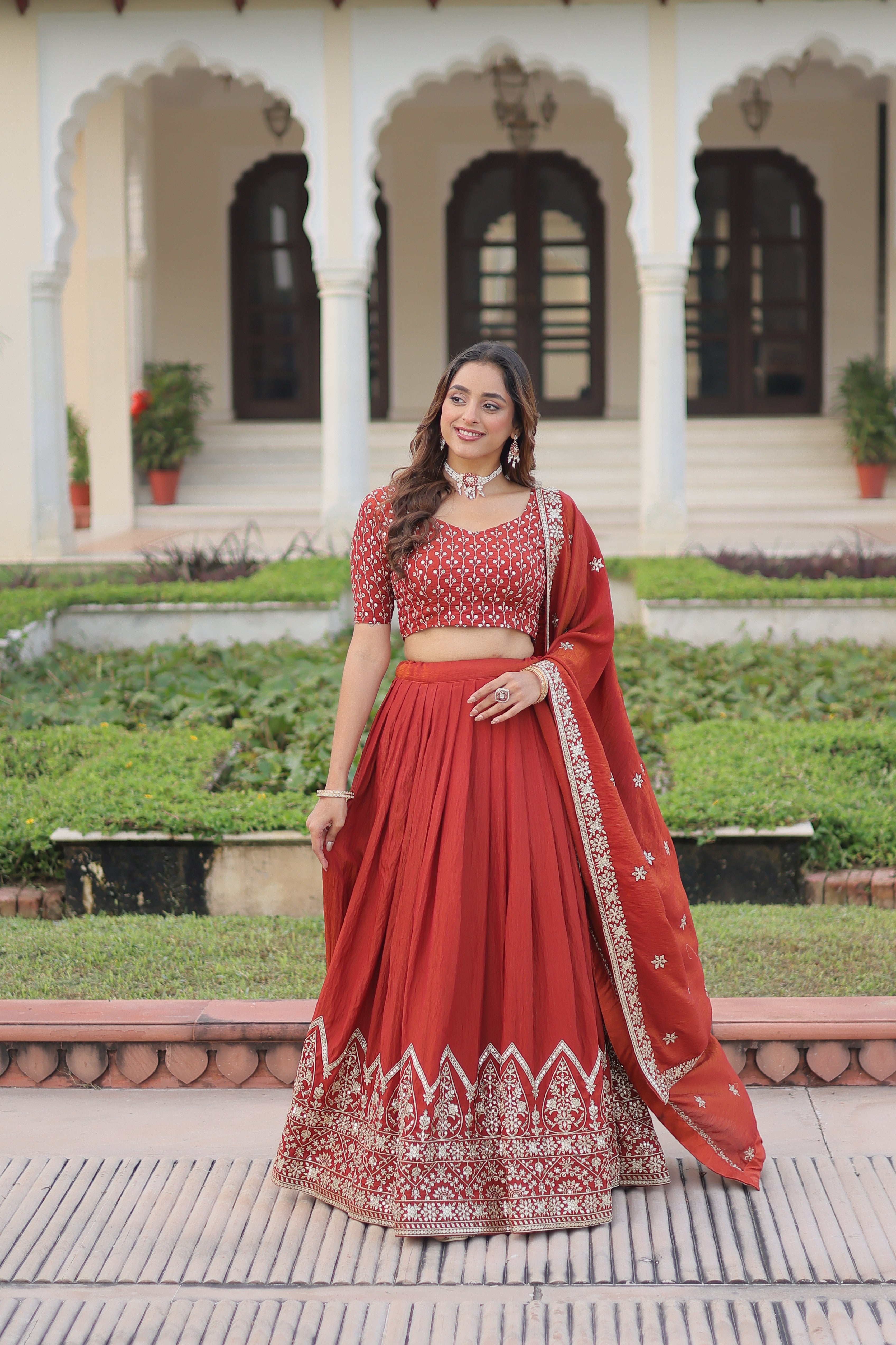 Omira orange Vichitra silk lehenga choli with sequins thread embroidery work