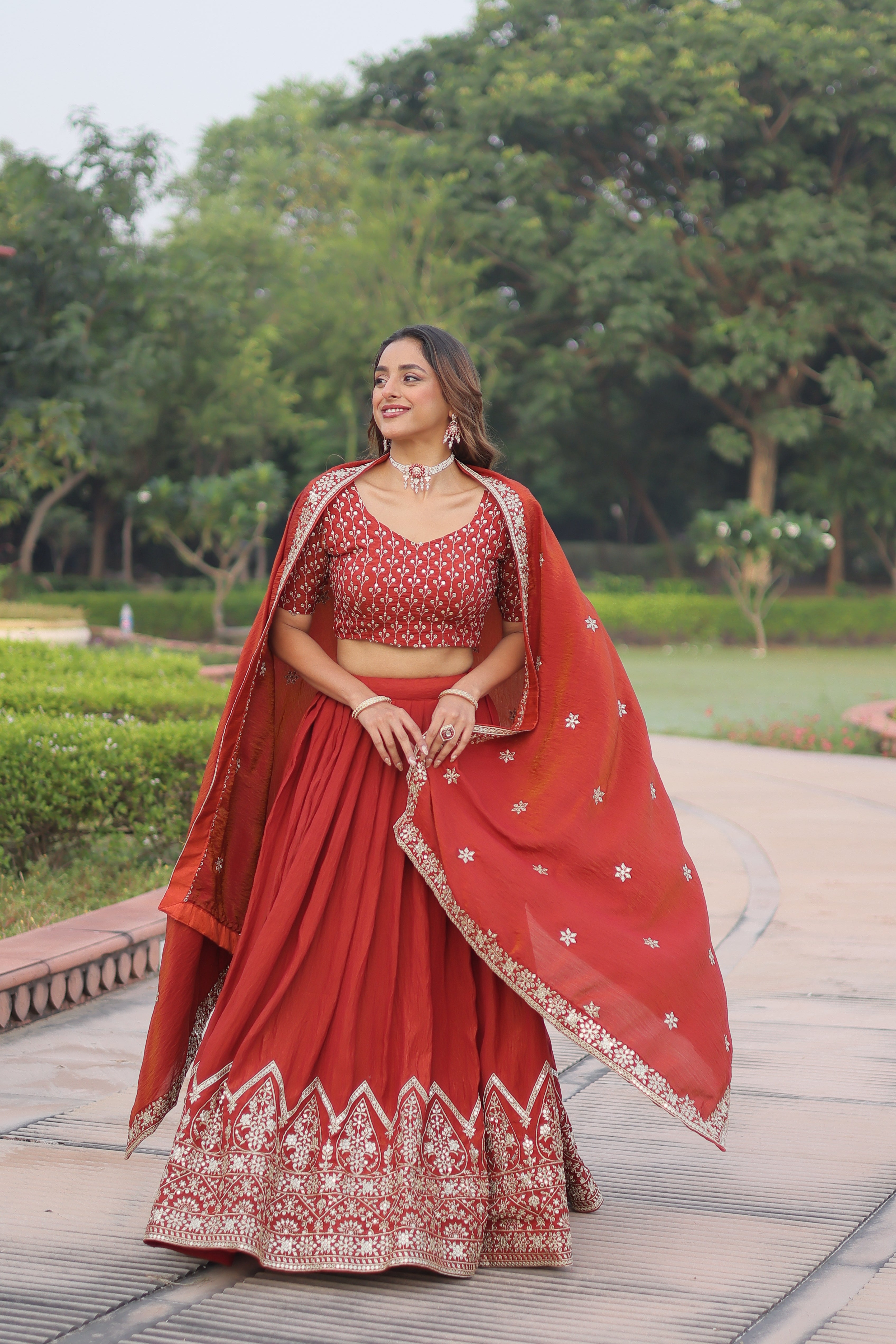 Omira orange Vichitra silk lehenga choli with sequins thread embroidery work