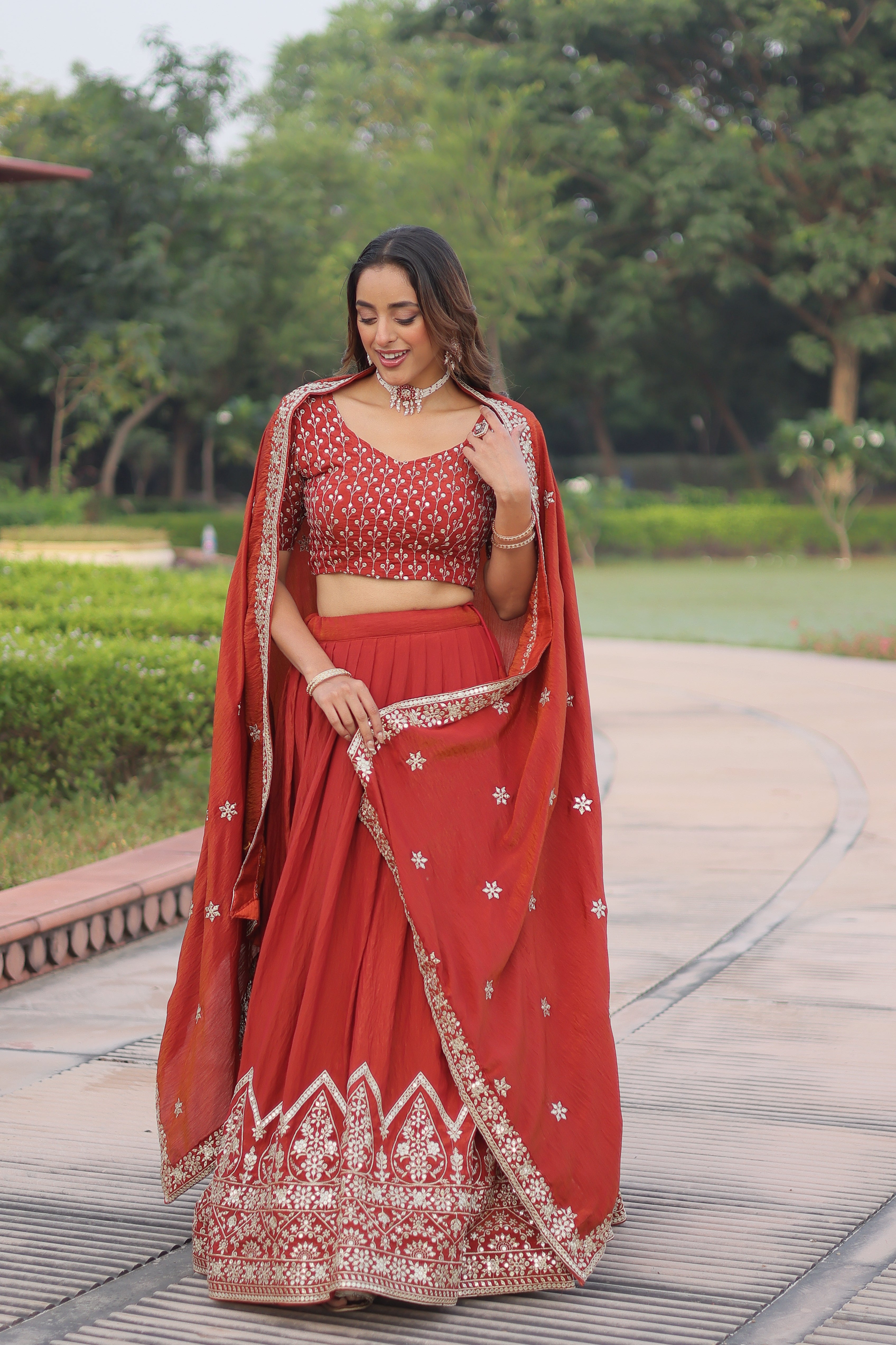 Omira orange Vichitra silk lehenga choli with sequins thread embroidery work