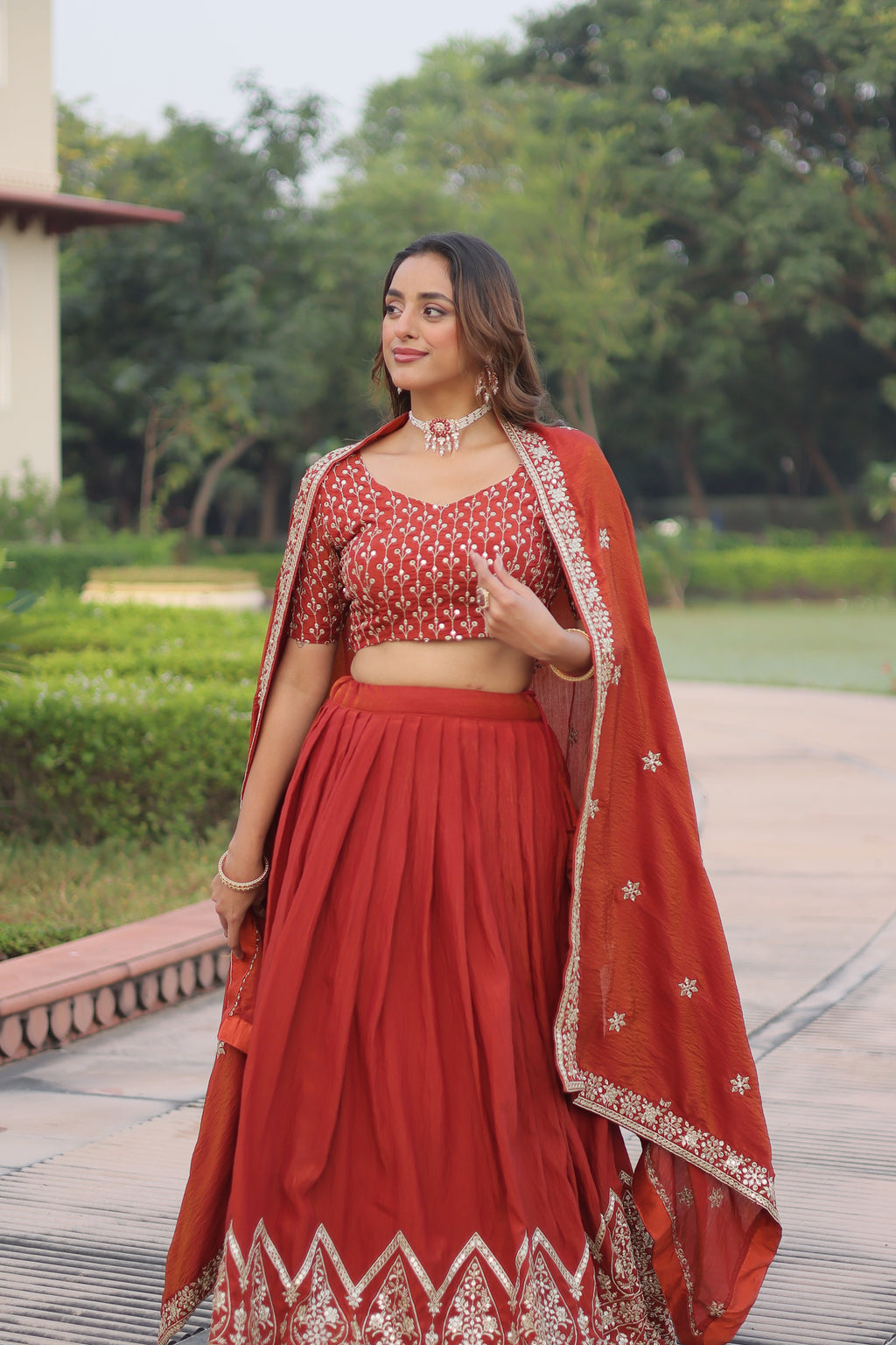 Omira orange Vichitra silk lehenga choli with sequins thread embroidery work