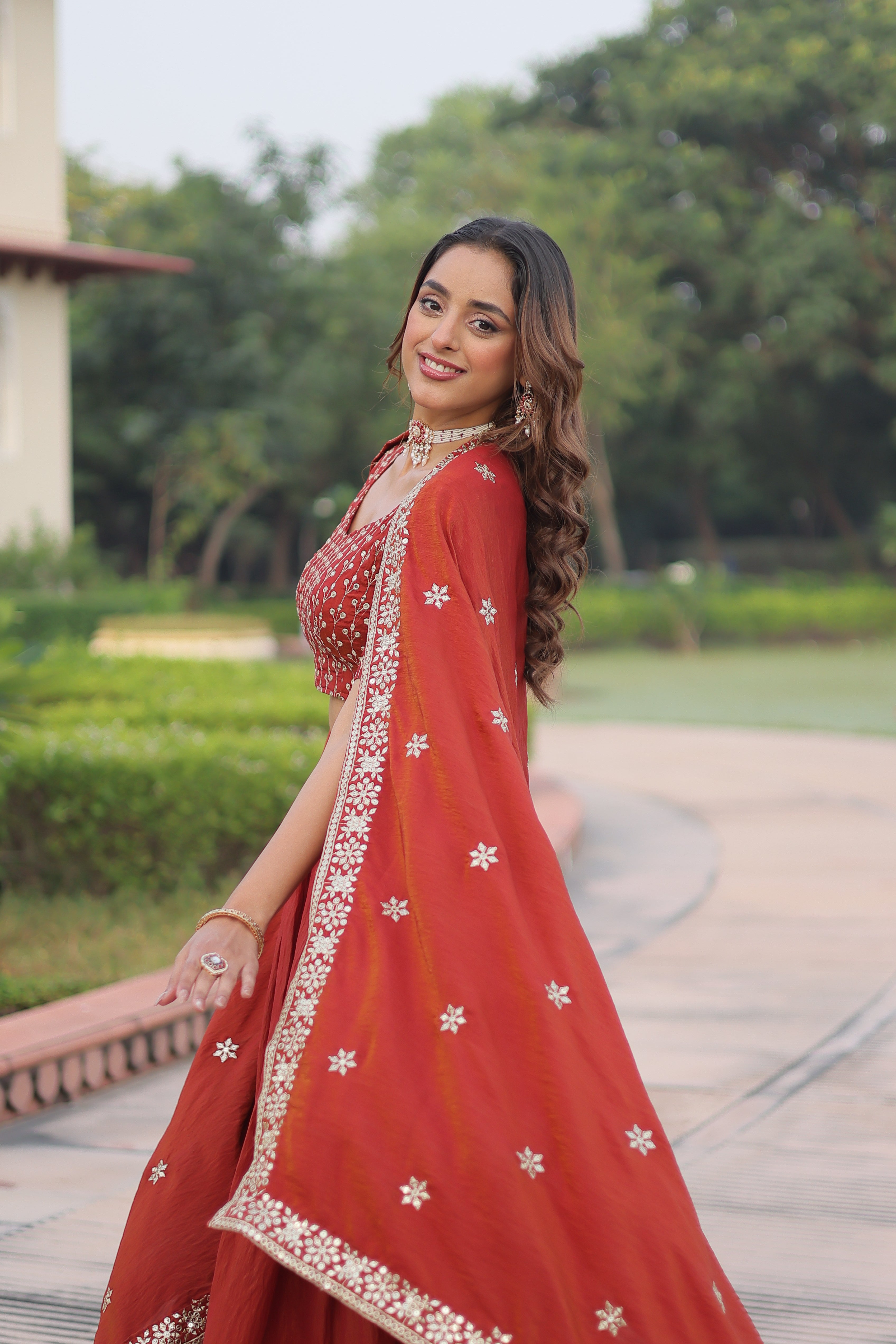 Omira orange Vichitra silk lehenga choli with sequins thread embroidery work