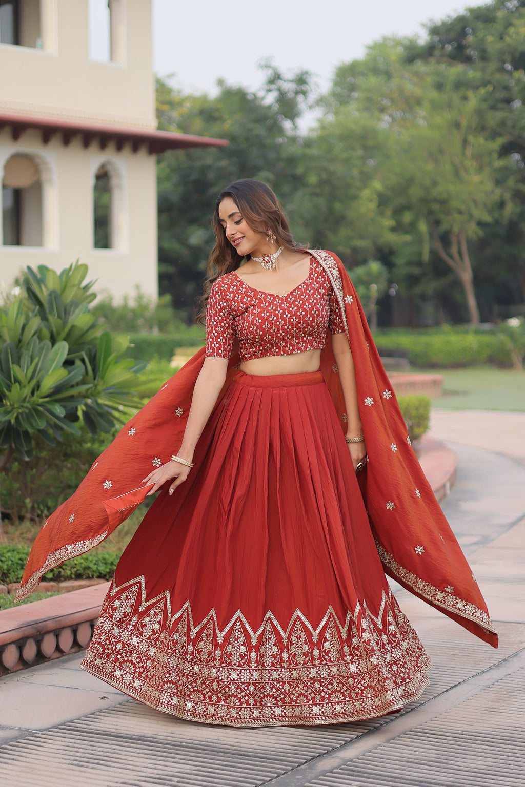 Omira orange Vichitra silk lehenga choli with sequins thread embroidery work