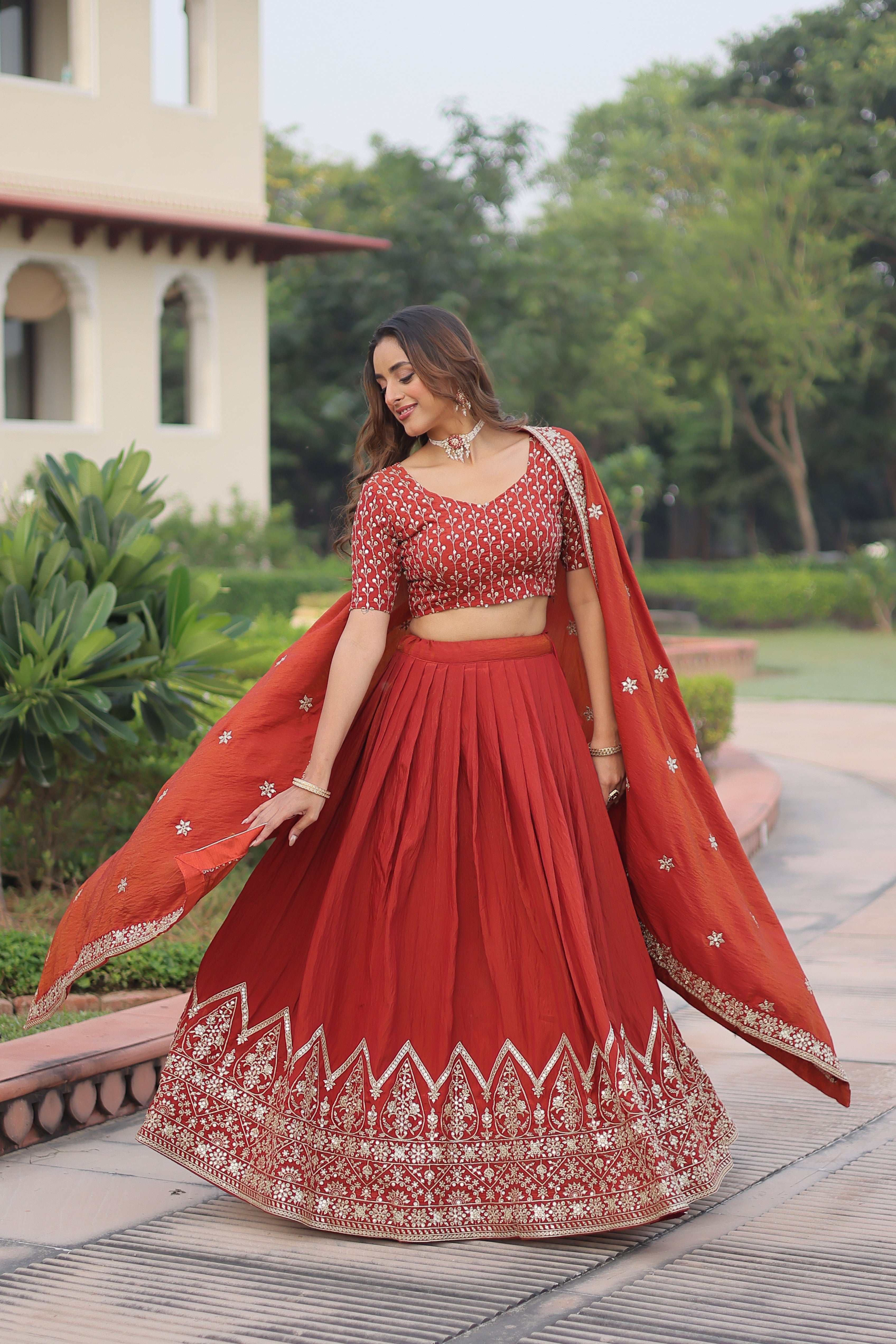 Omira orange Vichitra silk lehenga choli with sequins thread embroidery work
