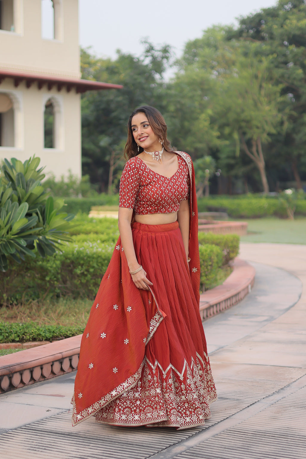 Omira orange Vichitra silk lehenga choli with sequins thread embroidery work