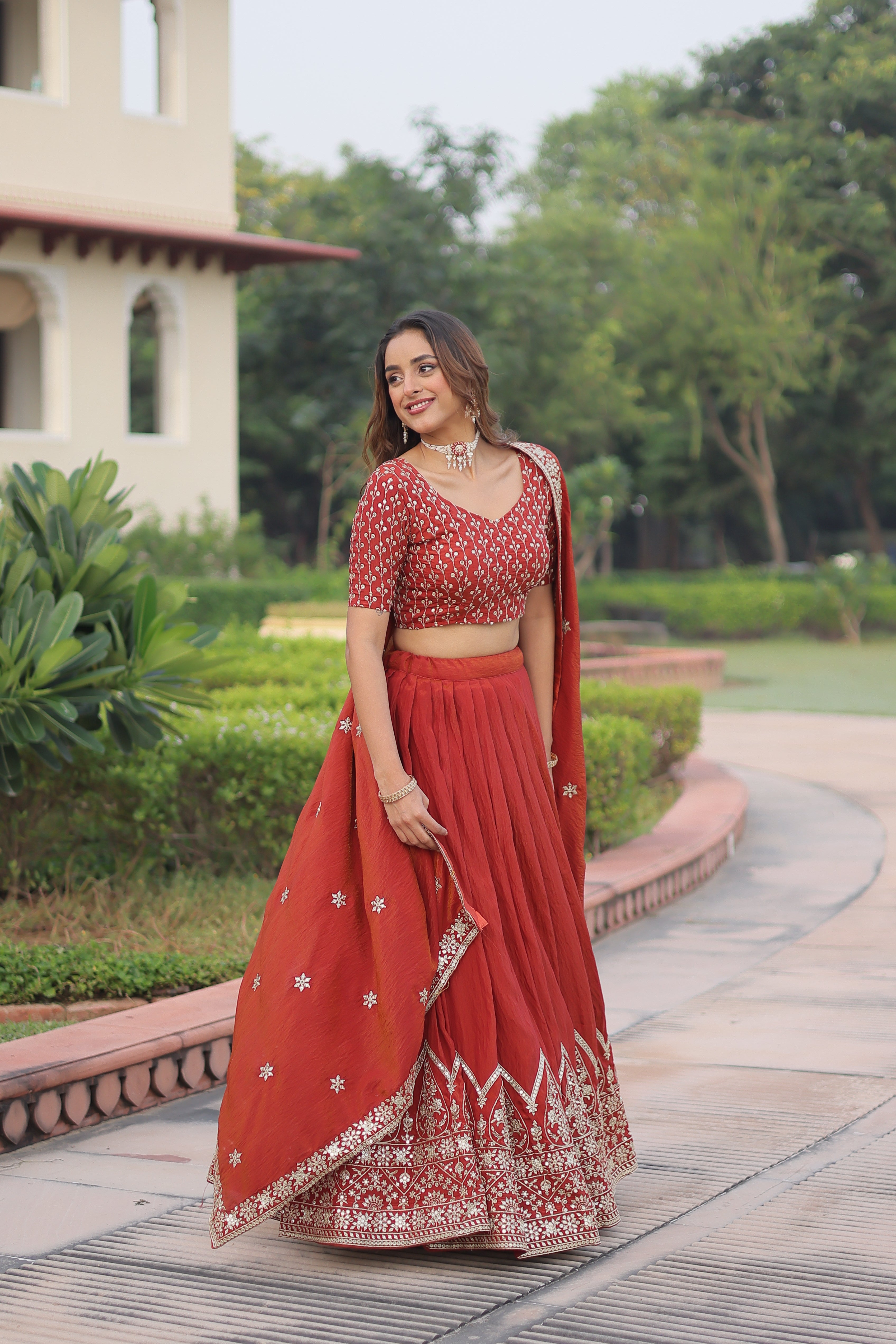 Omira orange Vichitra silk lehenga choli with sequins thread embroidery work