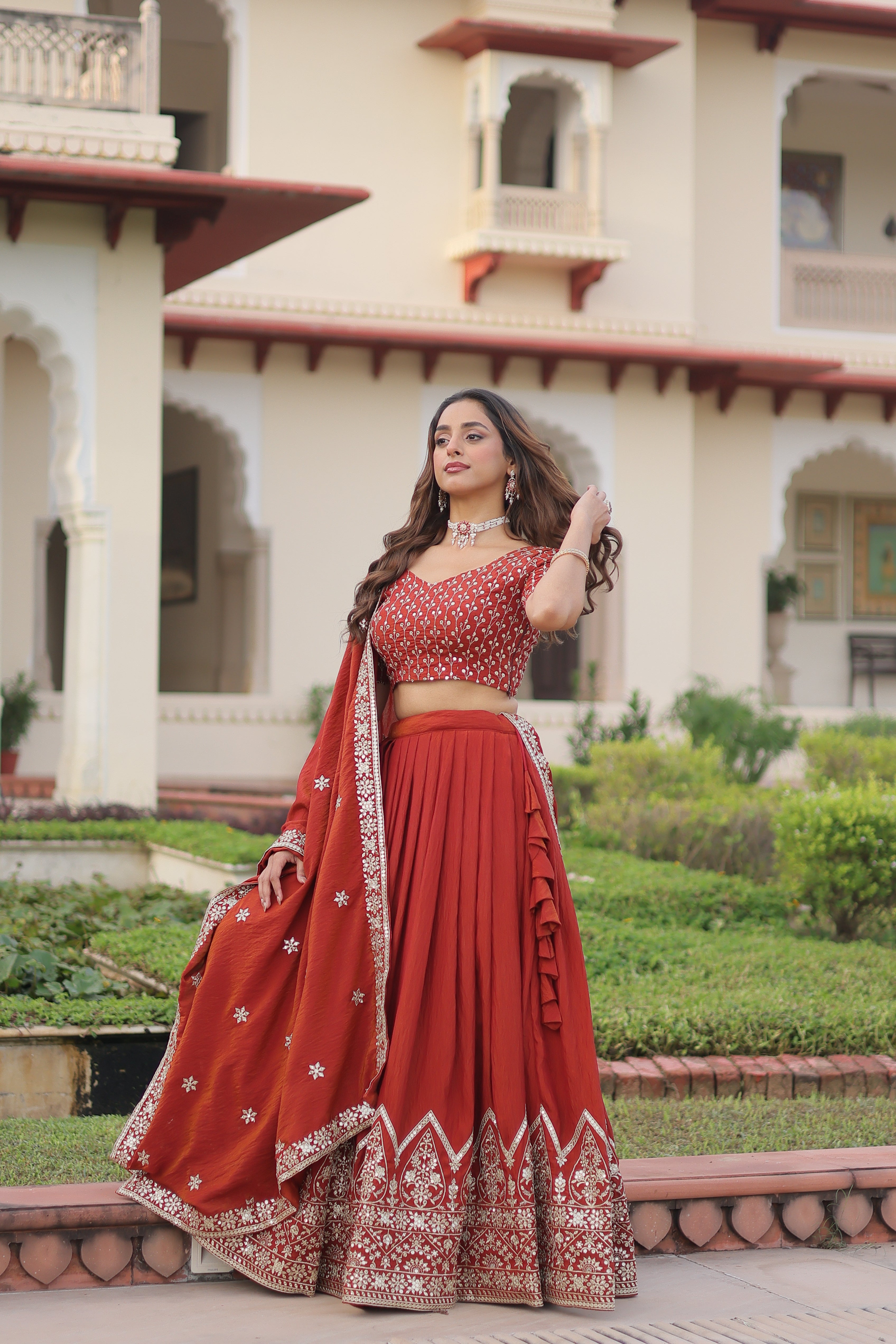 Omira orange Vichitra silk lehenga choli with sequins thread embroidery work