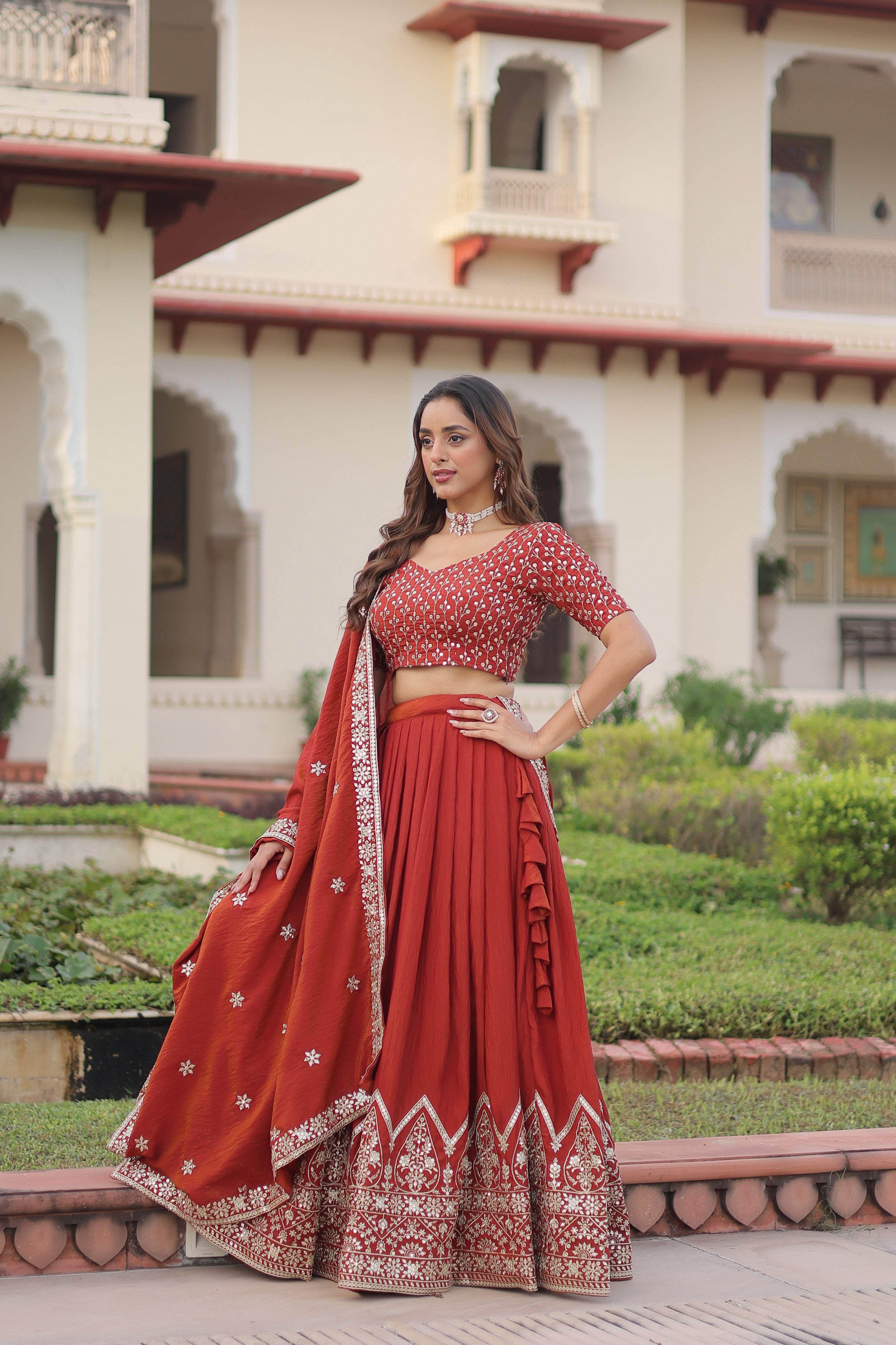 Omira orange Vichitra silk lehenga choli with sequins thread embroidery work