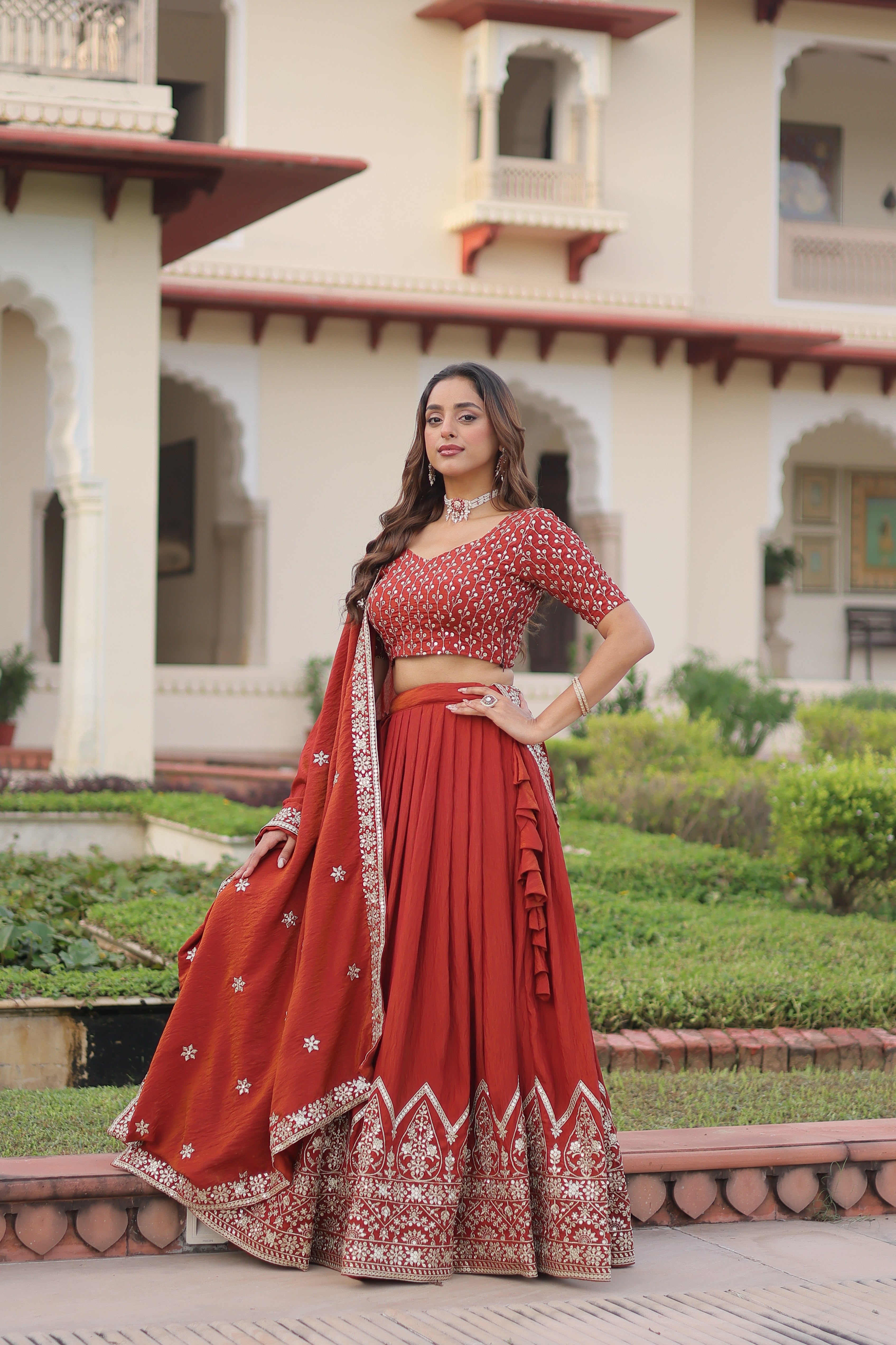 Omira orange Vichitra silk lehenga choli with sequins thread embroidery work