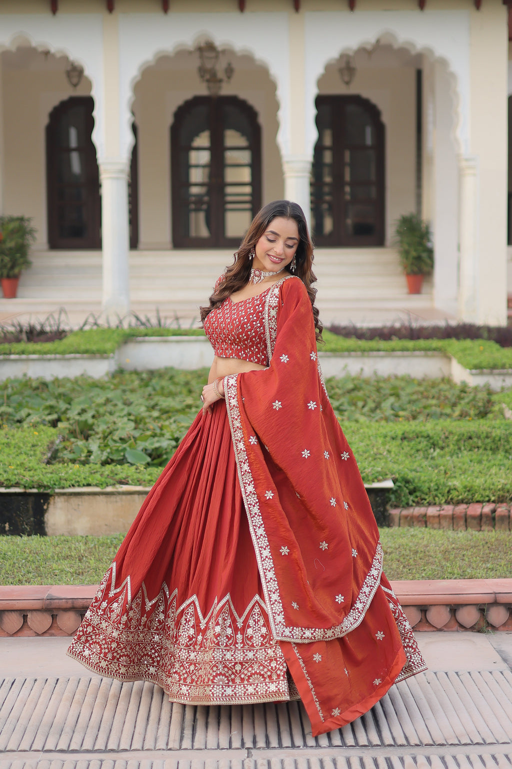 Omira orange Vichitra silk lehenga choli with sequins thread embroidery work