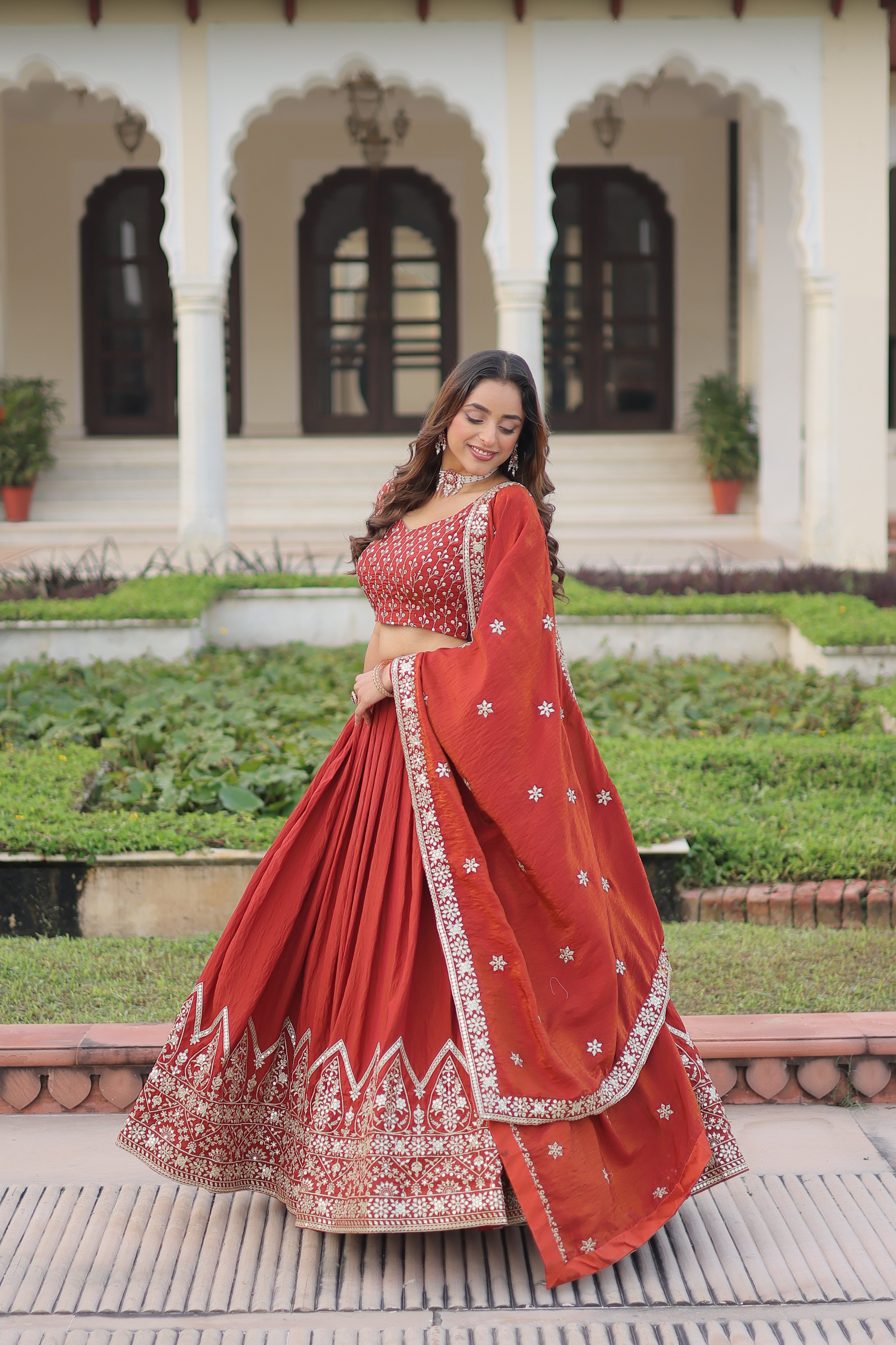 Omira orange Vichitra silk lehenga choli with sequins thread embroidery work