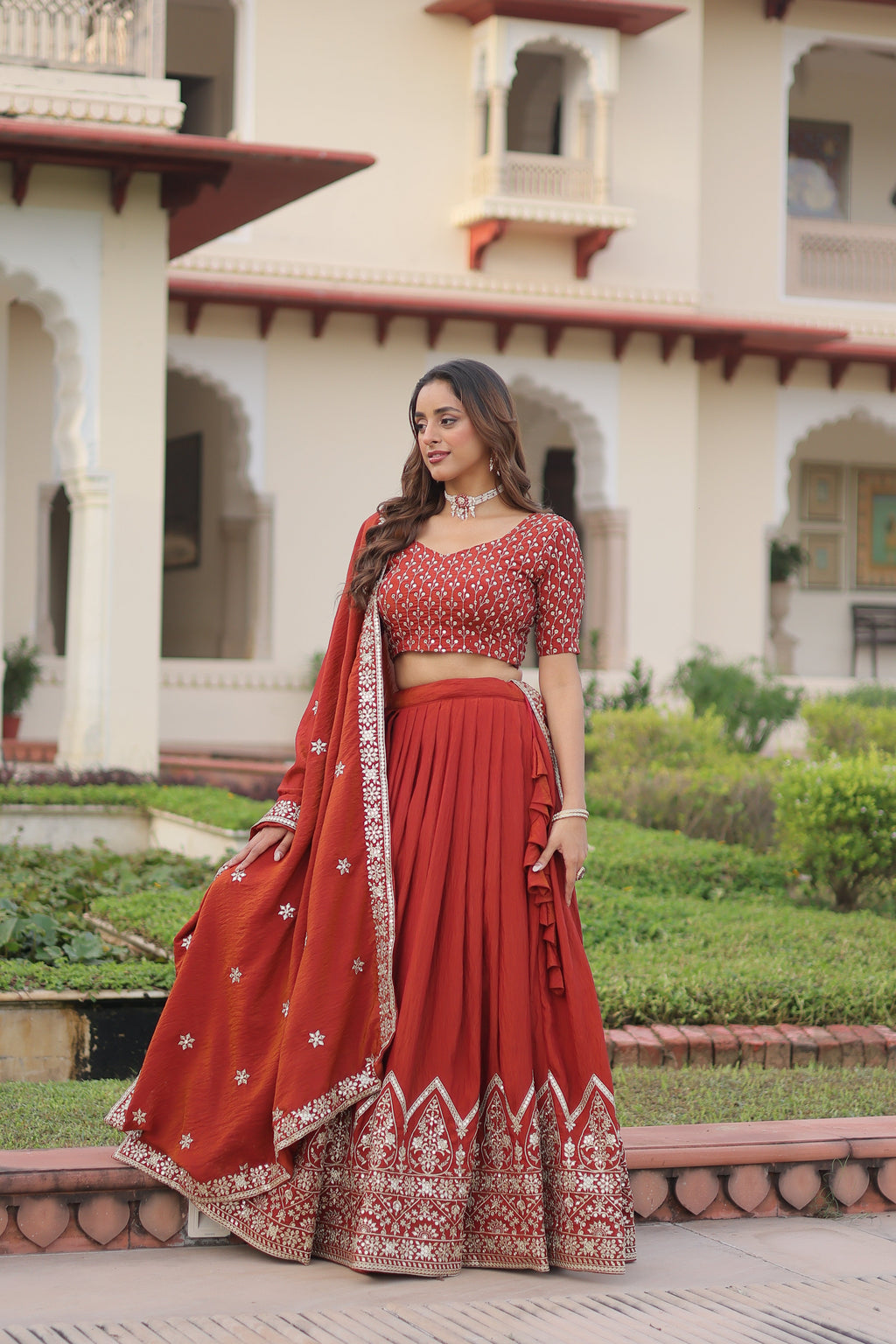 Omira orange Vichitra silk lehenga choli with sequins thread embroidery work