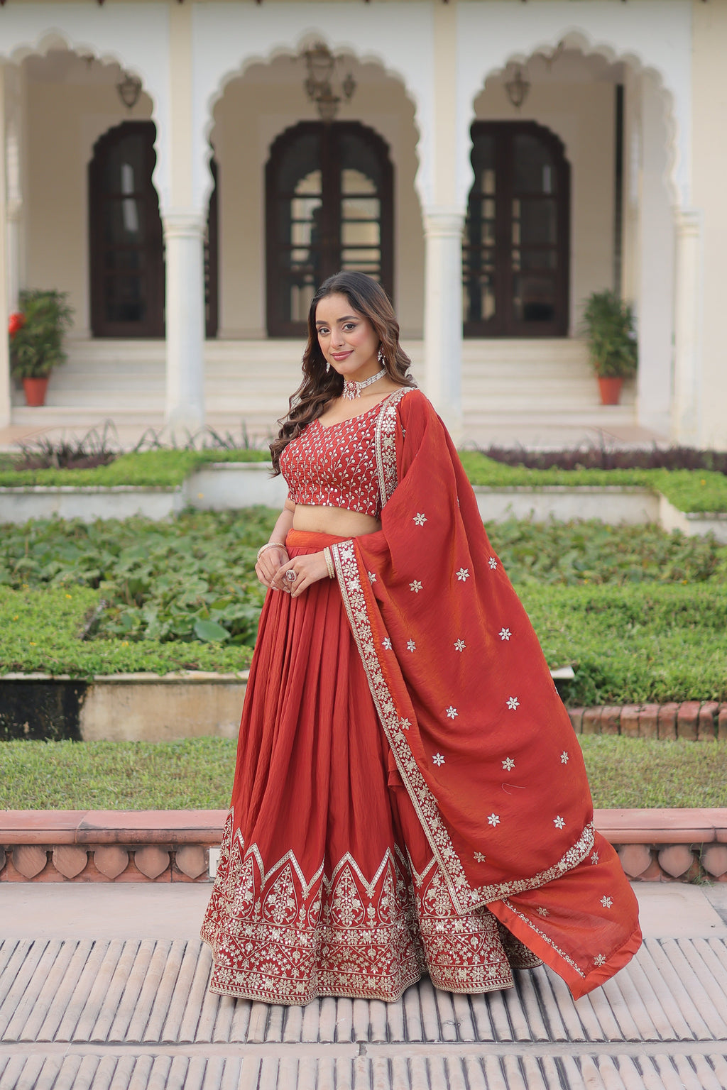 Omira orange Vichitra silk lehenga choli with sequins thread embroidery work