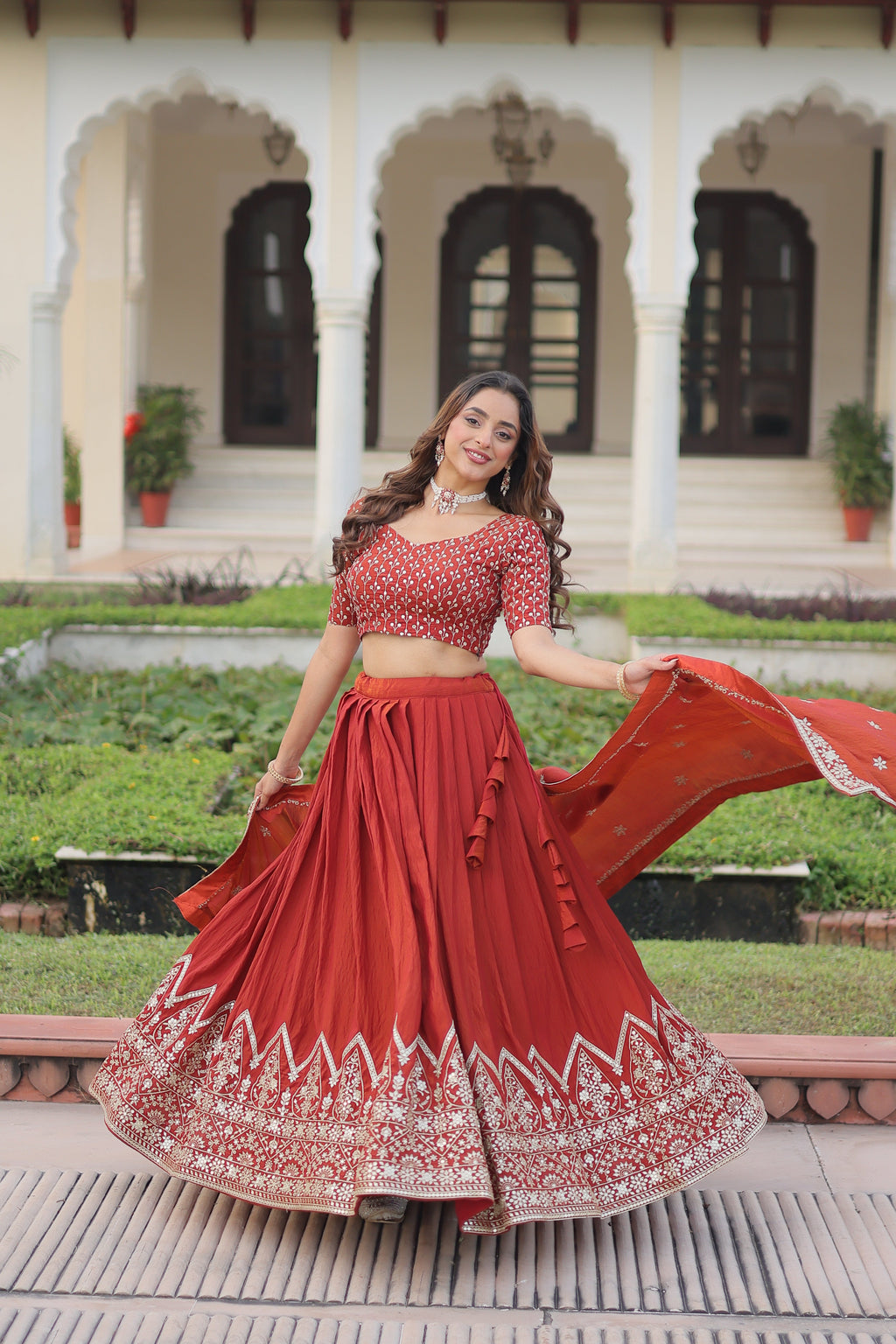 Omira orange Vichitra silk lehenga choli with sequins thread embroidery work