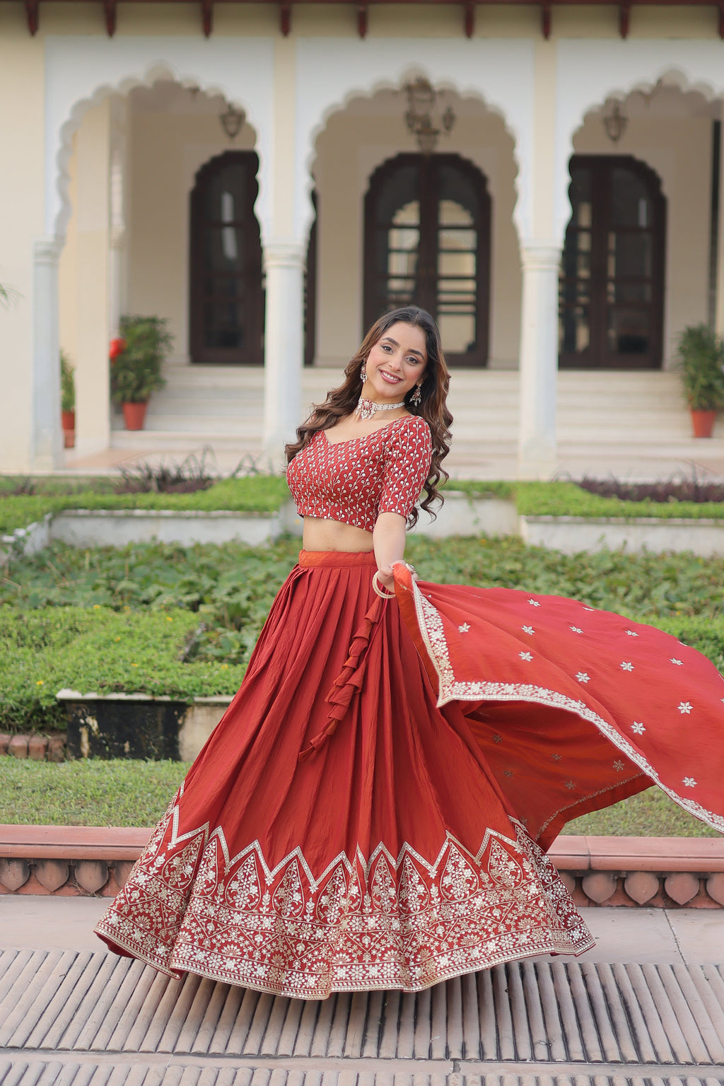 Omira orange Vichitra silk lehenga choli with sequins thread embroidery work