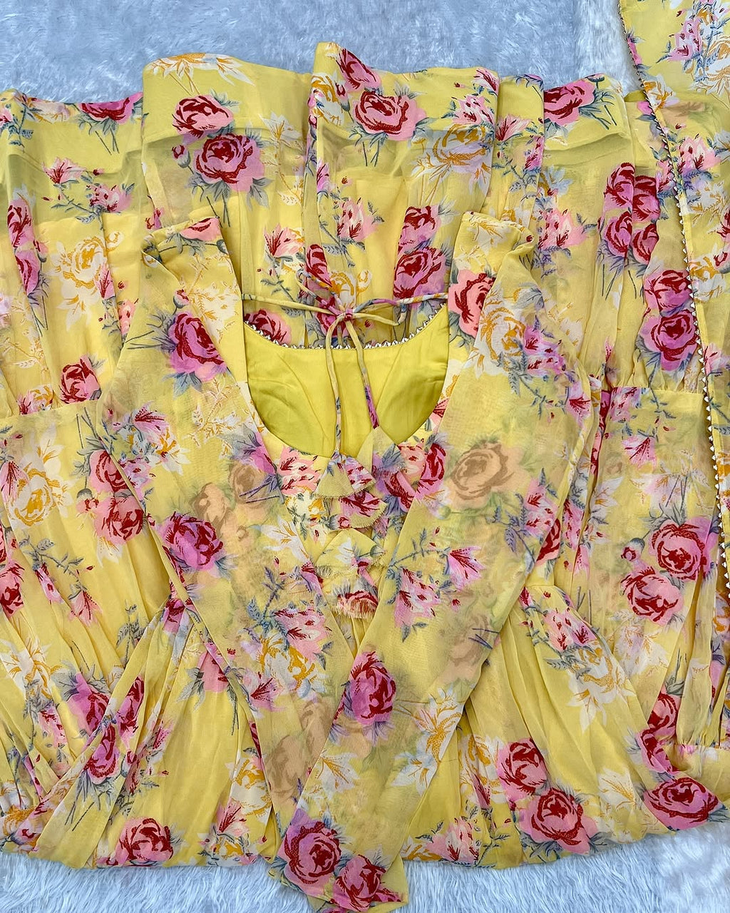 Kanika soft georgette huge flair yellow anarkali suit set