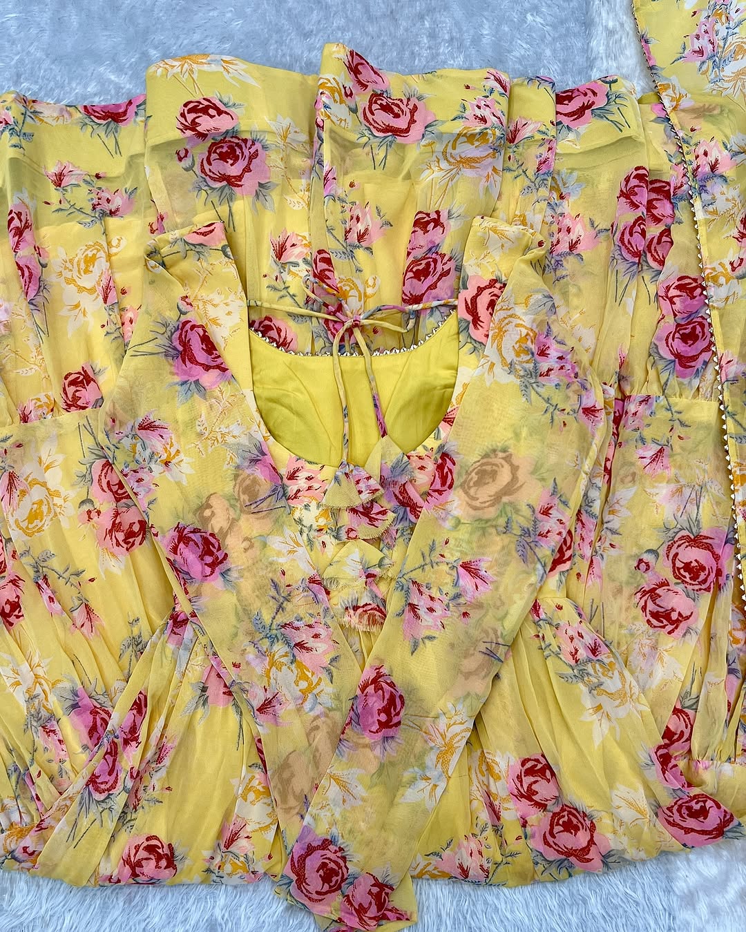Kanika soft georgette huge flair yellow anarkali suit set