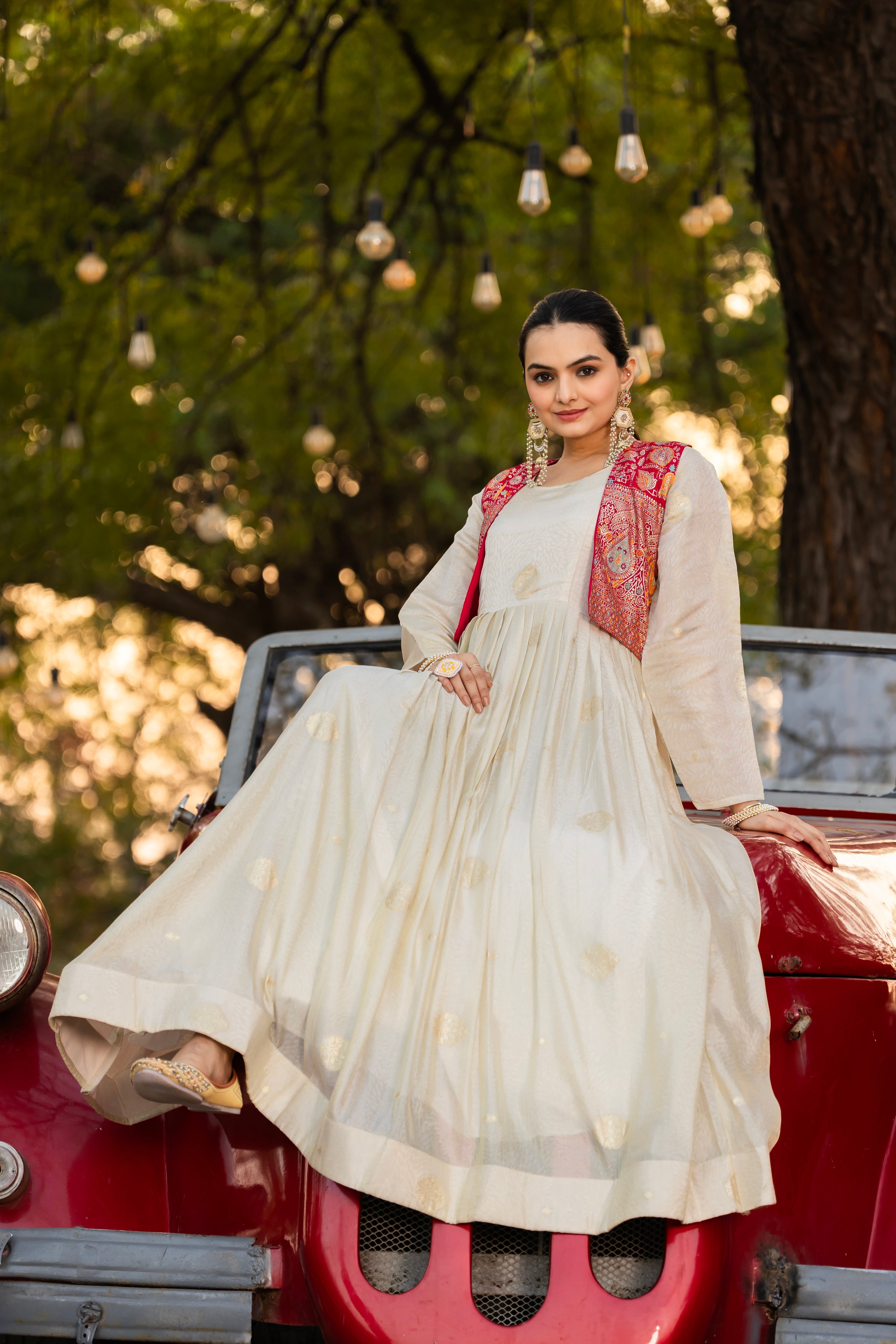 Off-white jacquard butti gown with pink koti