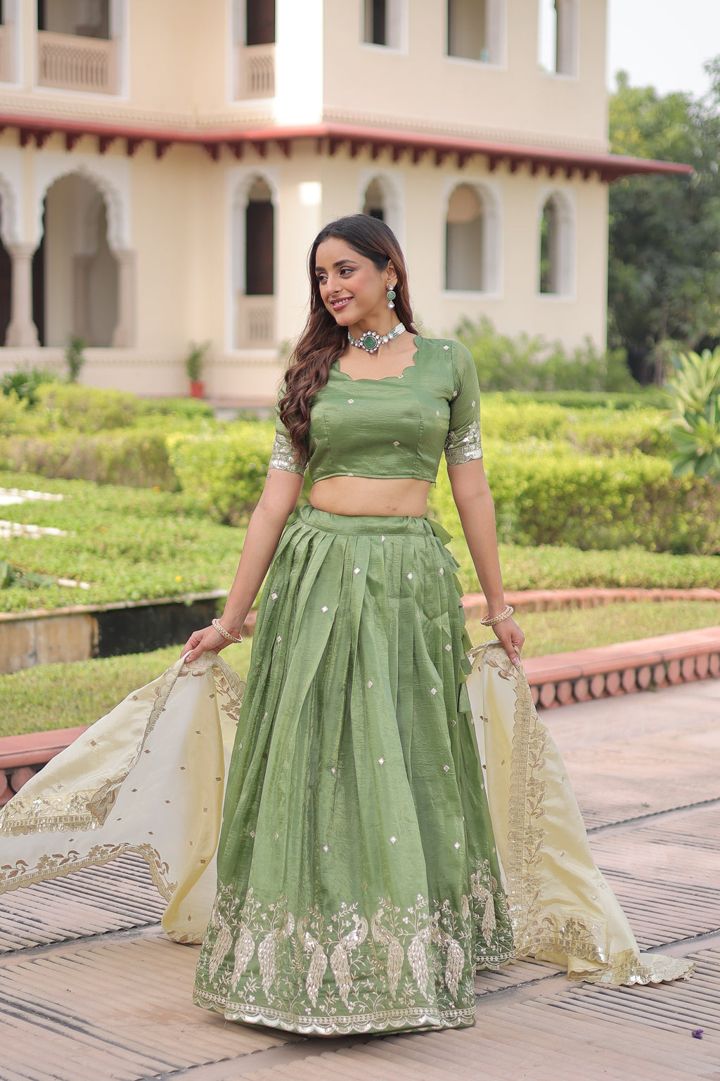 Nirika green gold crush lehenga choli with sequins zari embroidered work