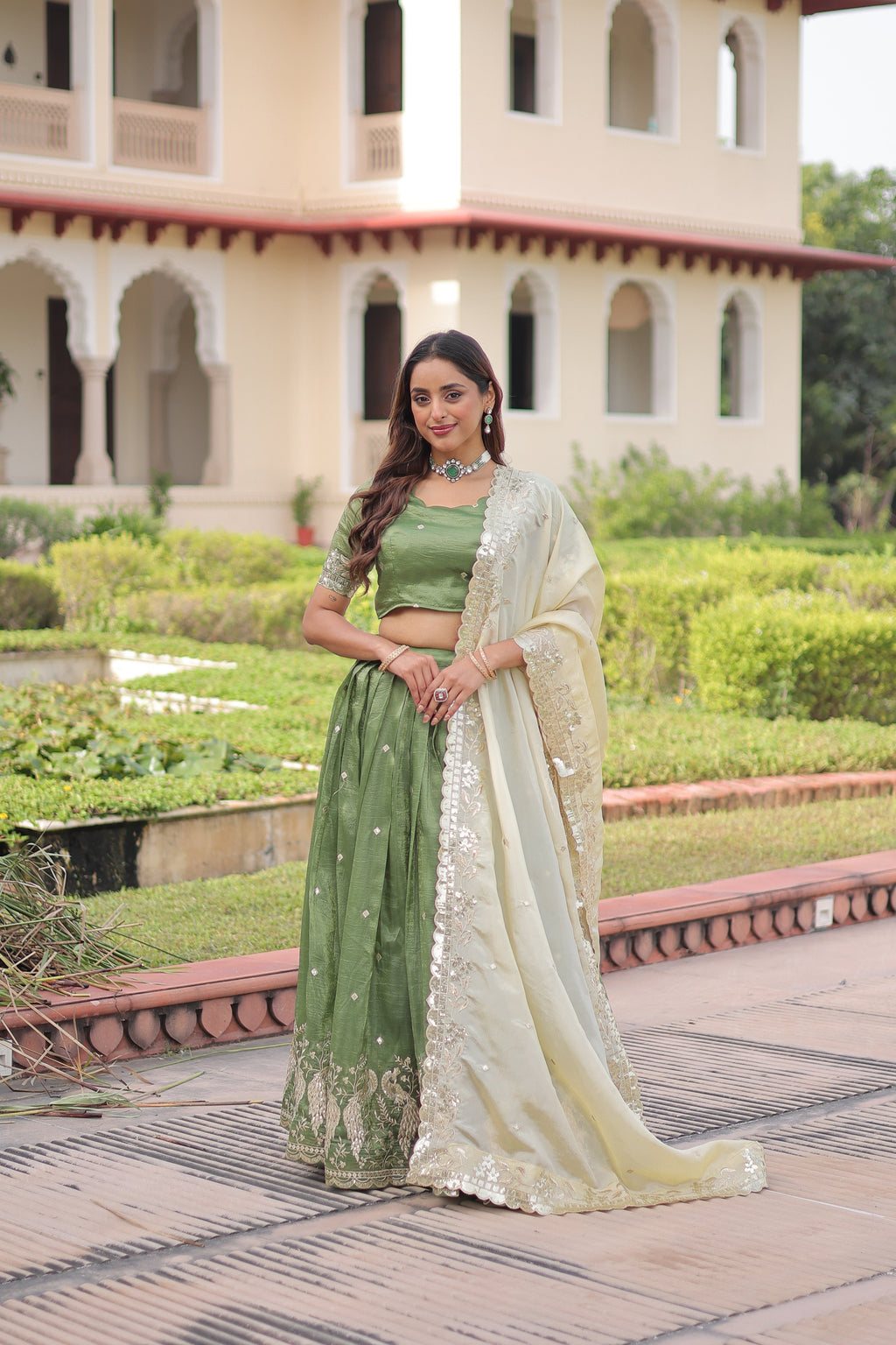 Nirika green gold crush lehenga choli with sequins zari embroidered work