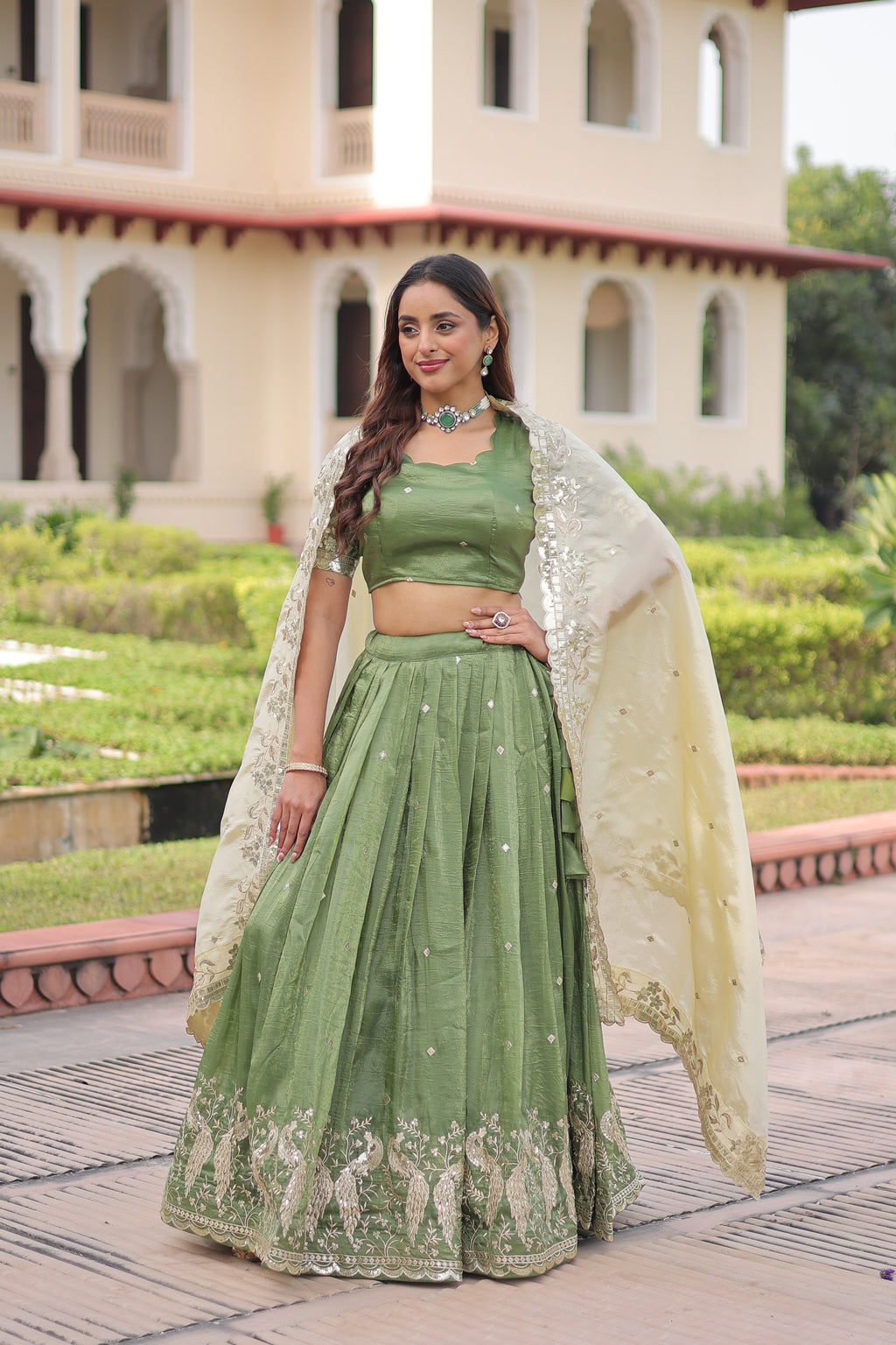 Nirika green gold crush lehenga choli with sequins zari embroidered work