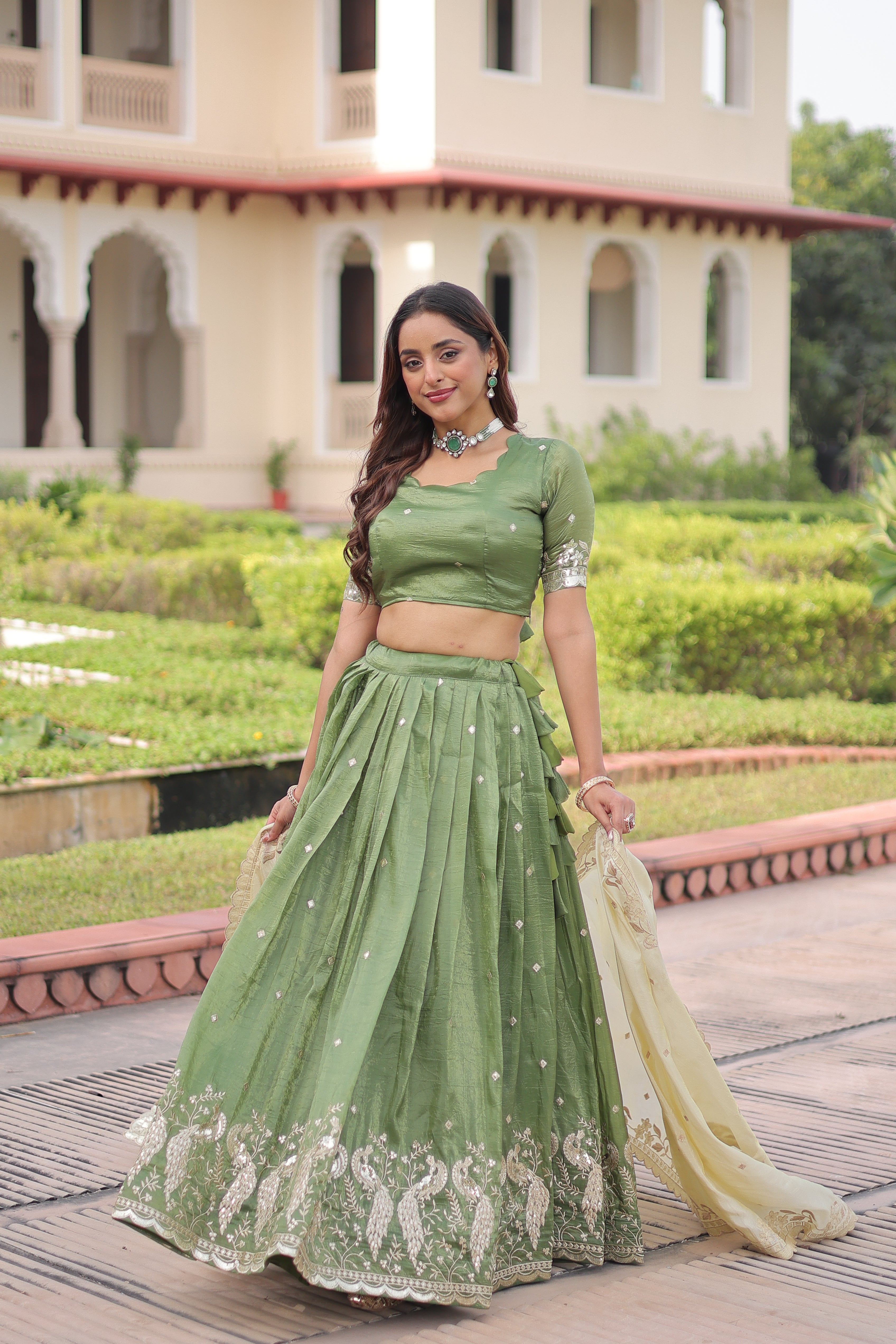 Nirika green gold crush lehenga choli with sequins zari embroidered work