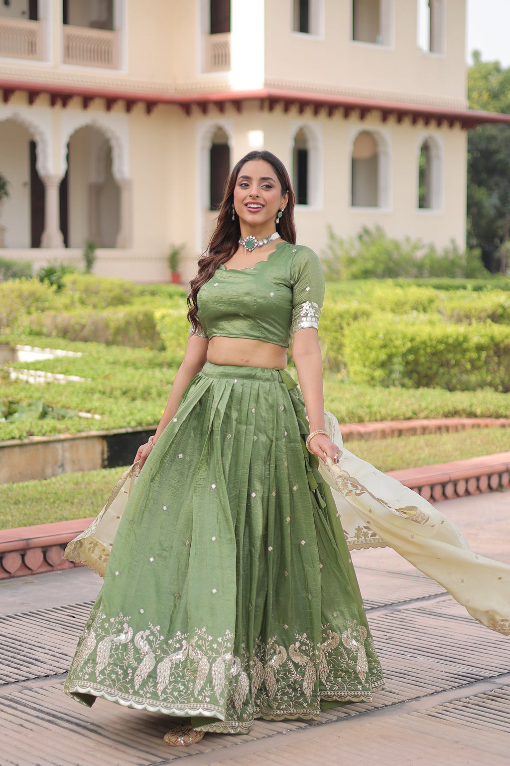Nirika green gold crush lehenga choli with sequins zari embroidered work